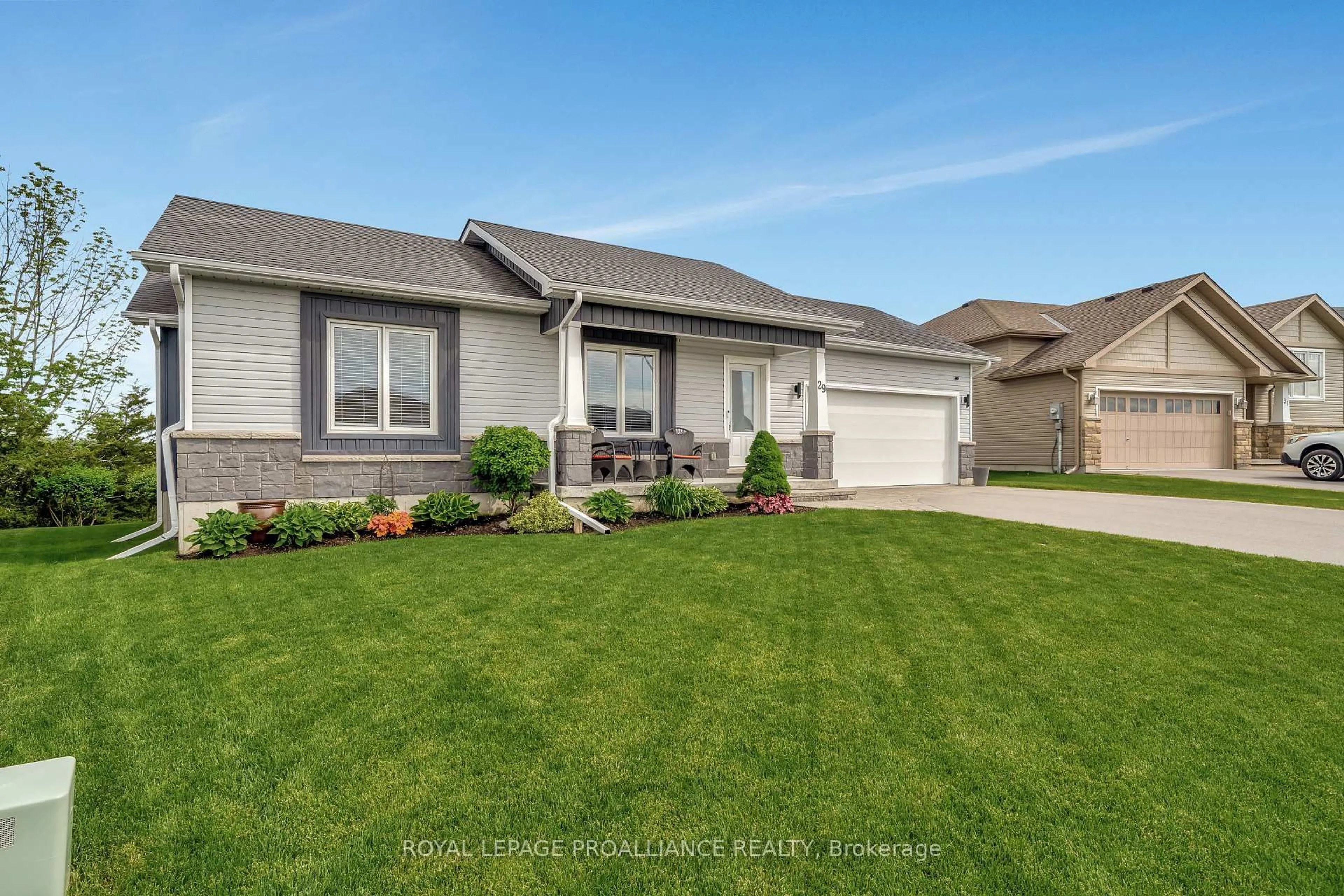 Home with vinyl exterior material, street for 29 Meagan Lane, Hastings Ontario K0K 2C0