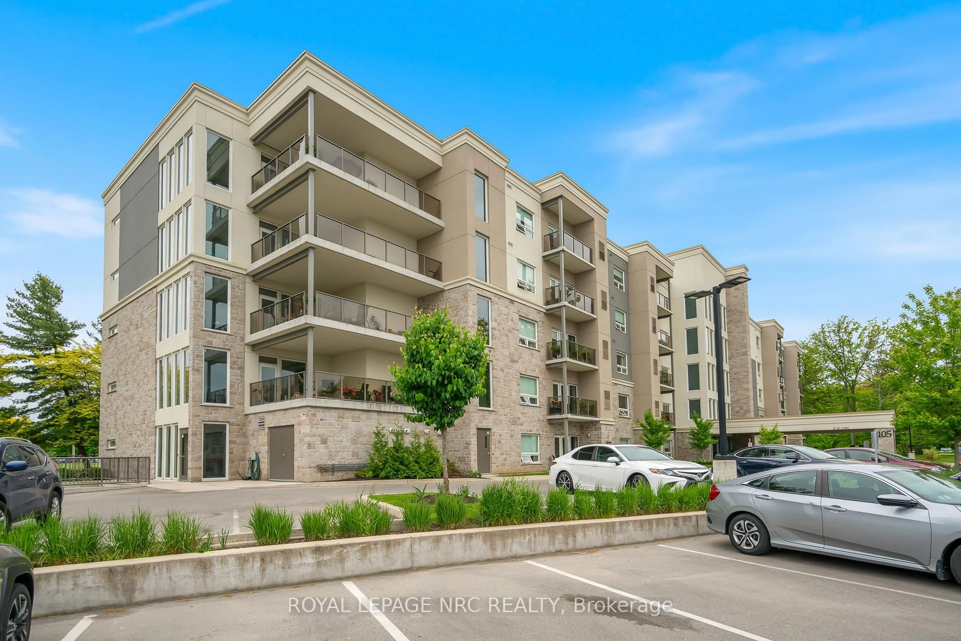 A pic from outside/outdoor area/front of a property/back of a property/a pic from drone, street for 105 Vansickle Rd #401, St. Catharines Ontario L2S 0G4