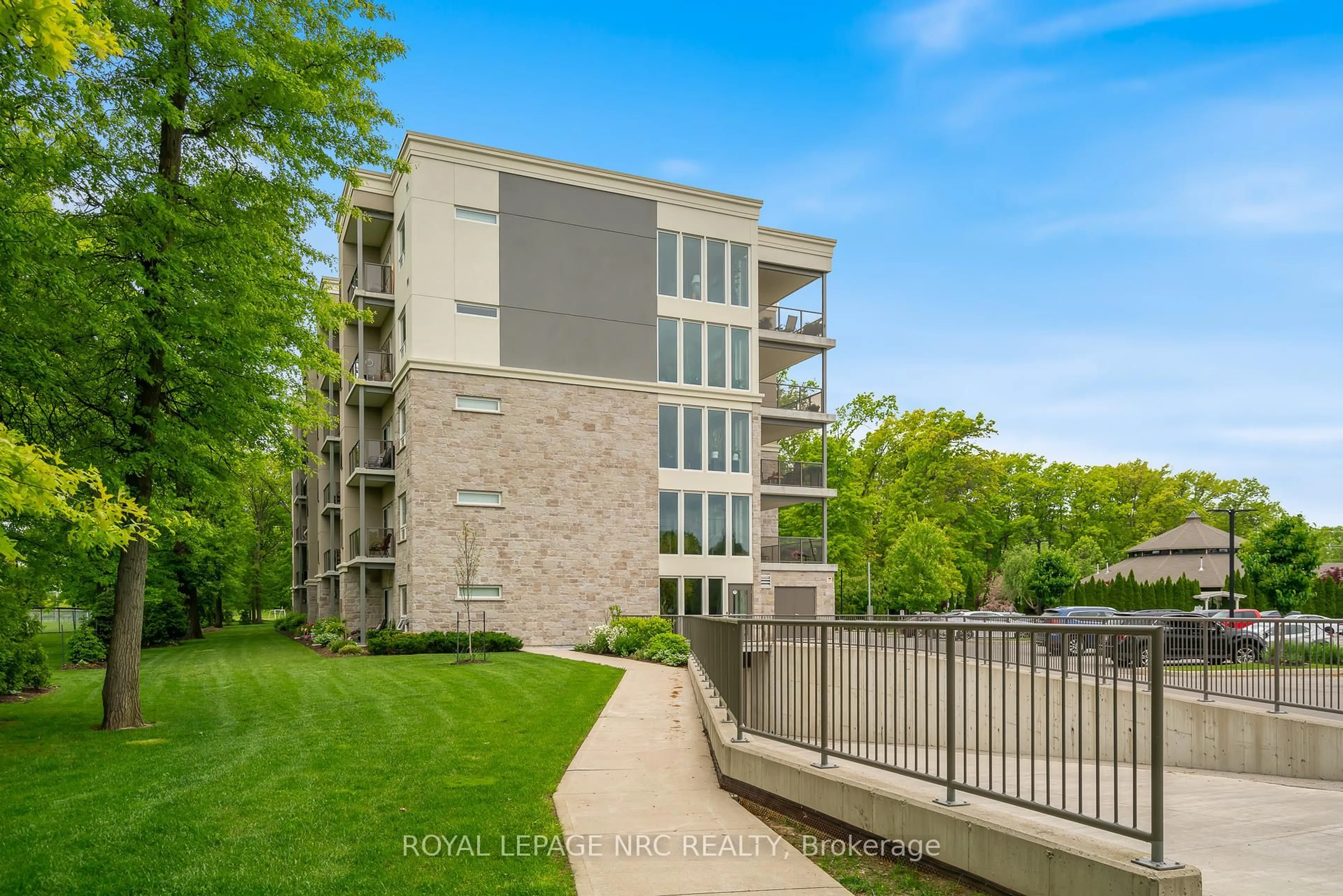 A pic from outside/outdoor area/front of a property/back of a property/a pic from drone, unknown for 105 Vansickle Rd #401, St. Catharines Ontario L2S 0G4