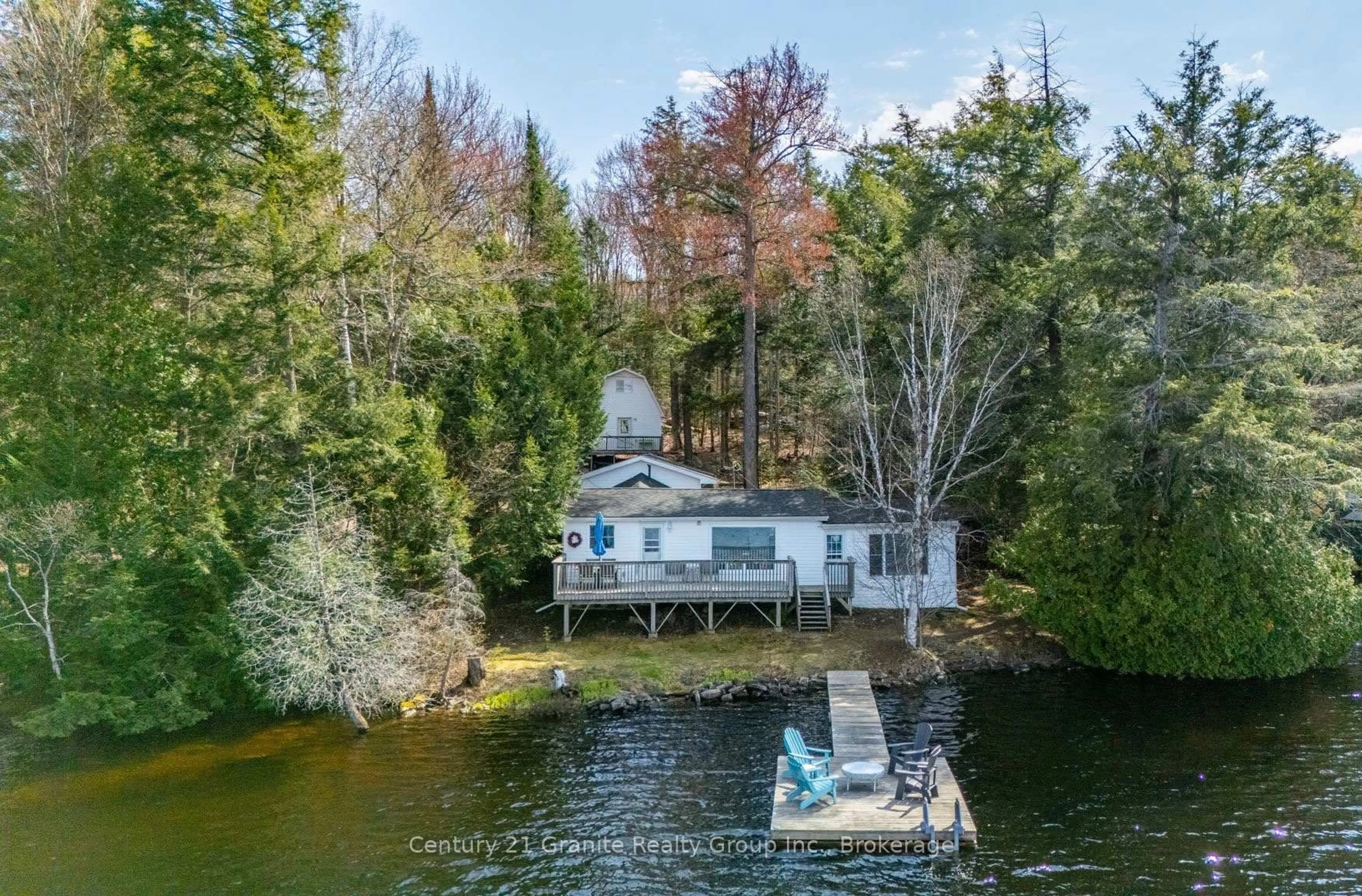 A pic from outside/outdoor area/front of a property/back of a property/a pic from drone, water/lake/river/ocean view for 1027 Heney Tr, Algonquin Highlands Ontario K0M 1S0
