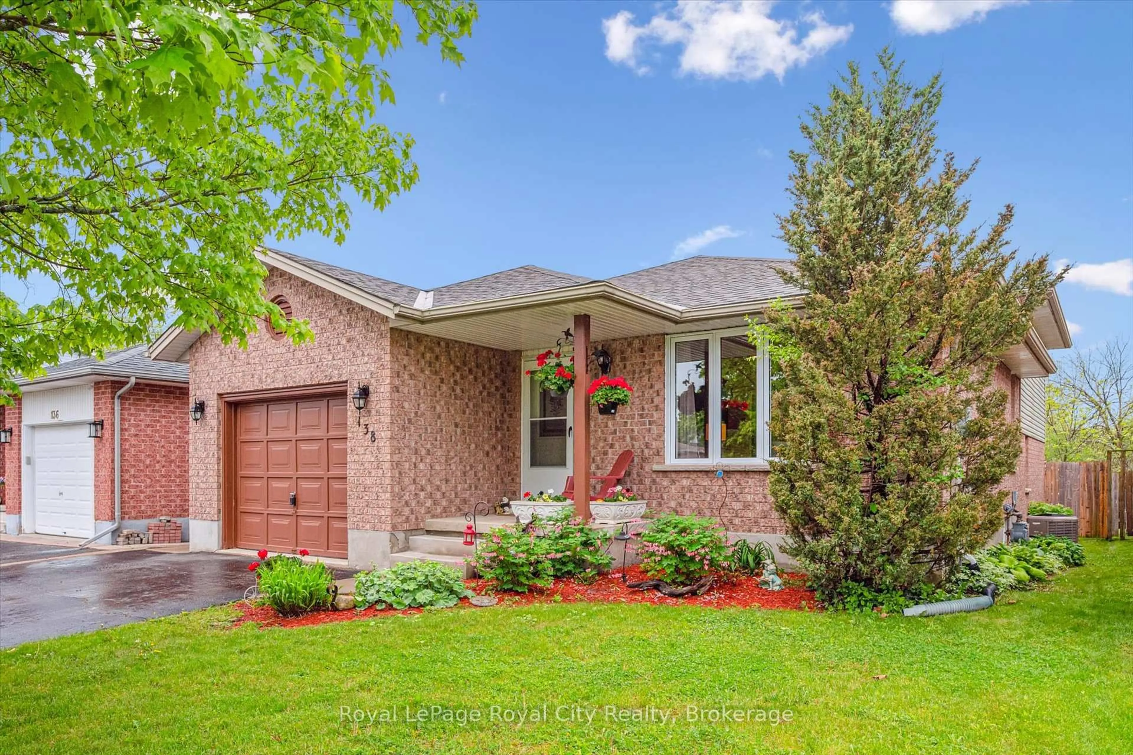 Home with brick exterior material, street for 138 Pheasant Run Dr, Guelph Ontario N1C 1B3