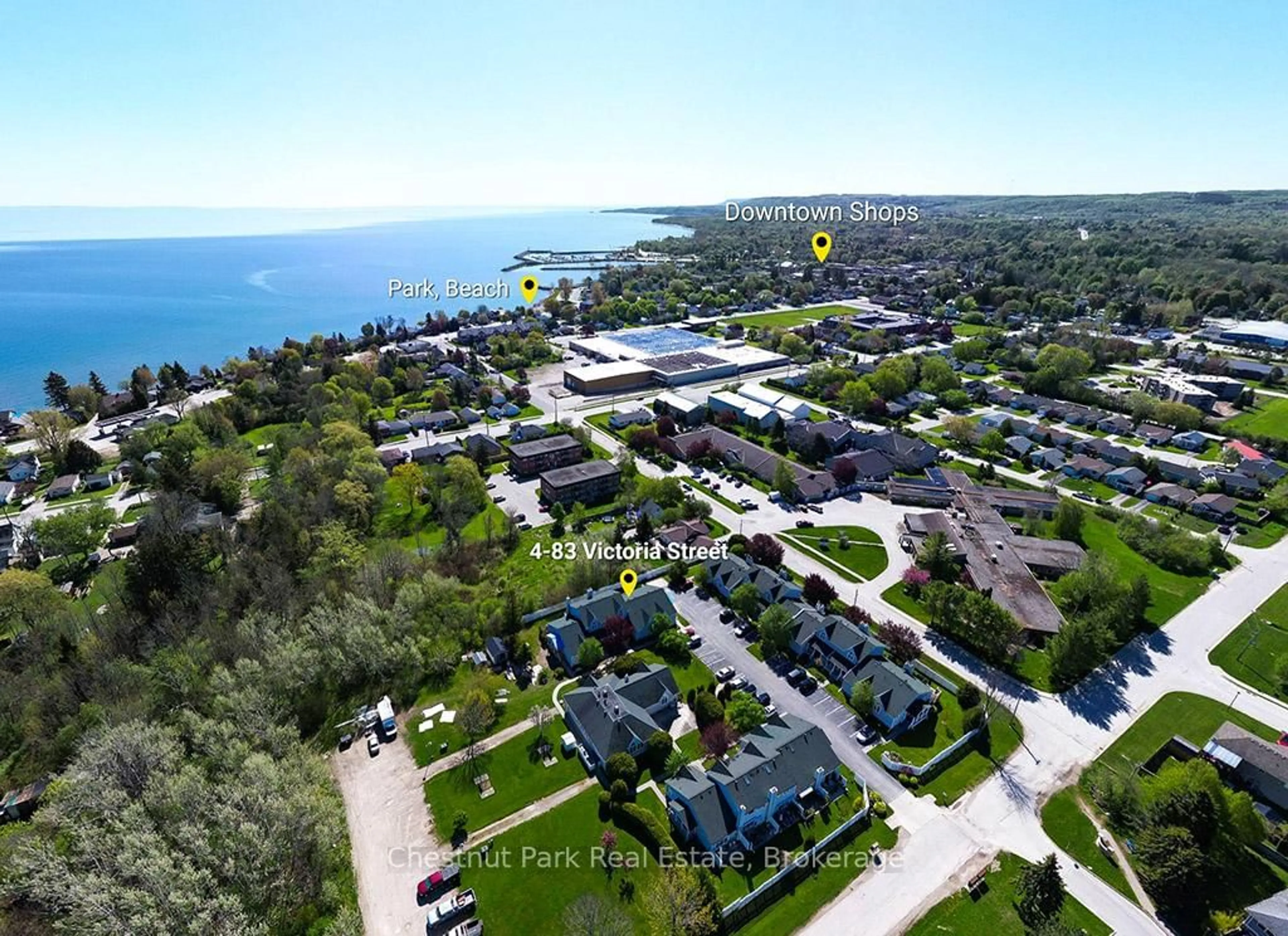 A pic from outside/outdoor area/front of a property/back of a property/a pic from drone, water/lake/river/ocean view for 83 Victoria St #4, Meaford Ontario N4L 1R4