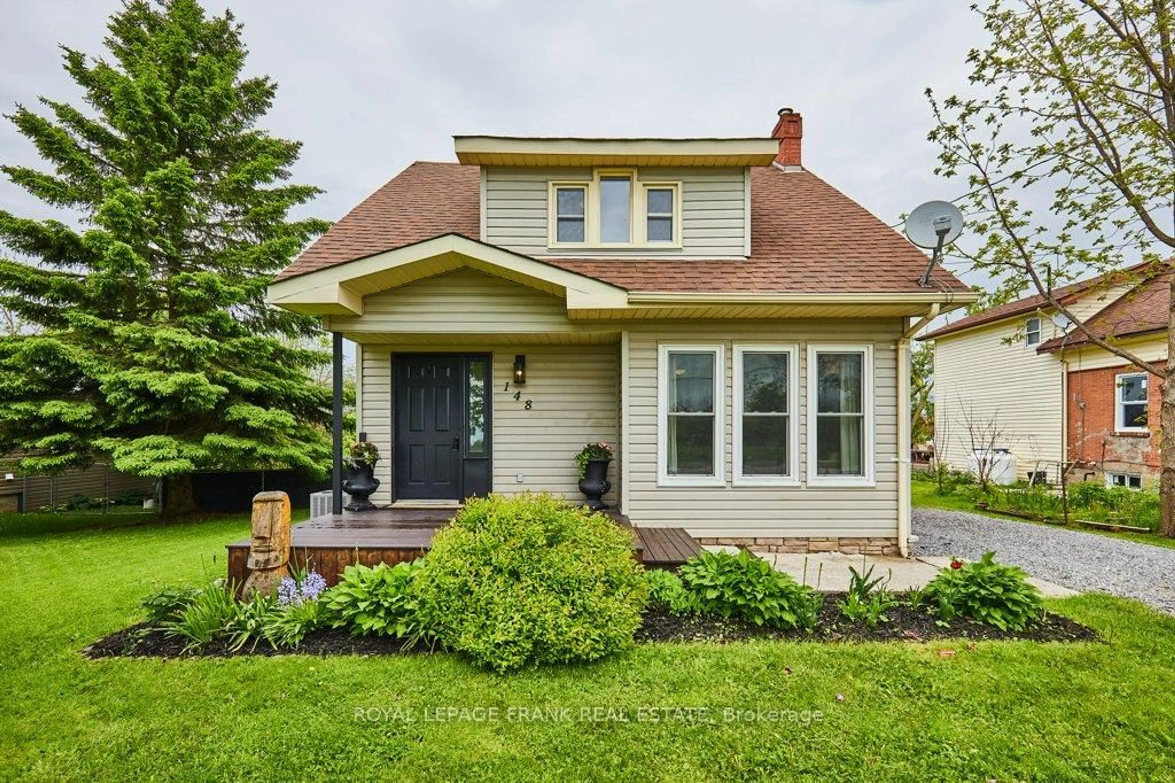 Home with vinyl exterior material, street for 148 King St, Kawartha Lakes Ontario K0M 2T0