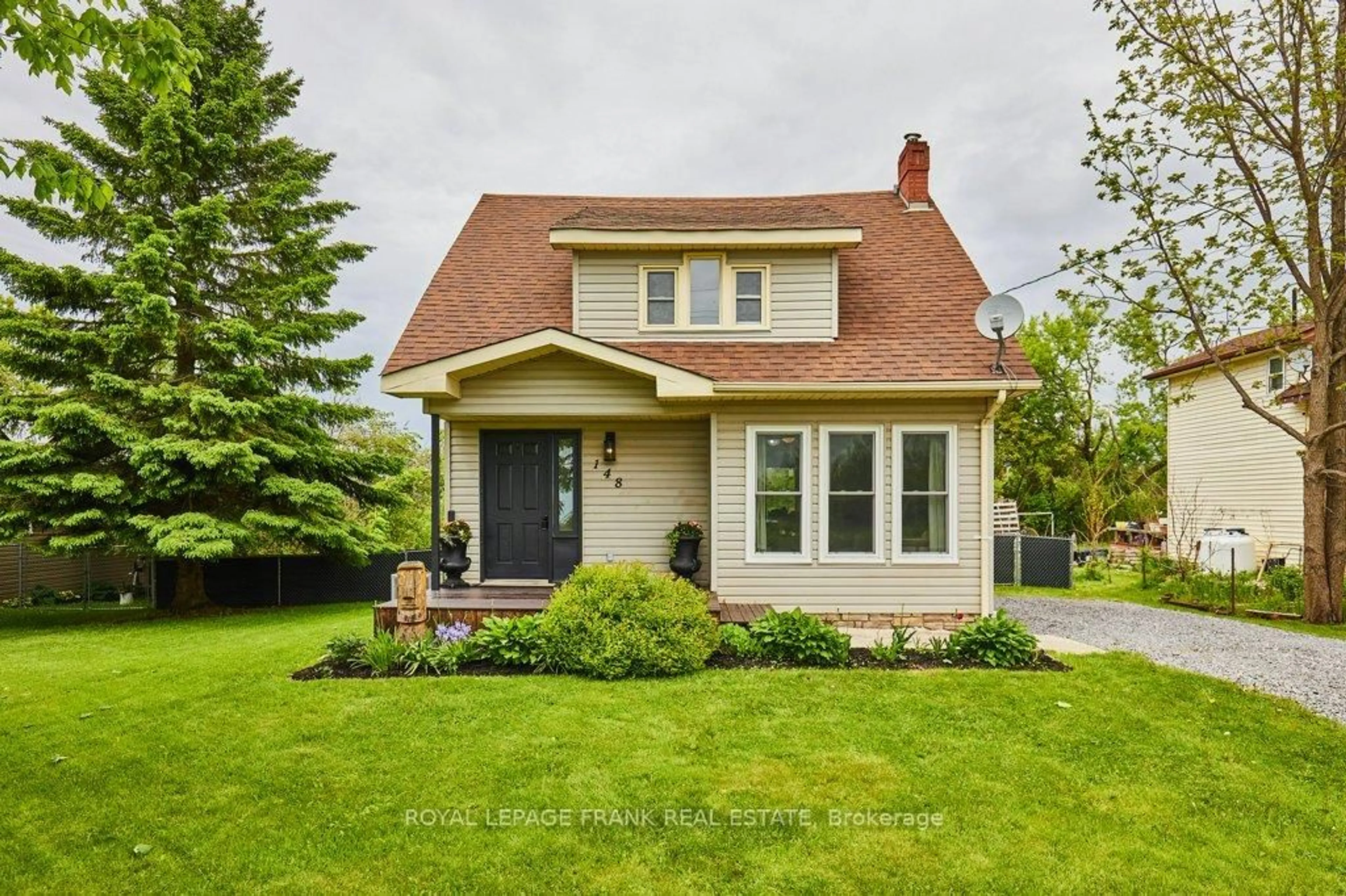 Home with vinyl exterior material, street for 148 King St, Kawartha Lakes Ontario K0M 2T0