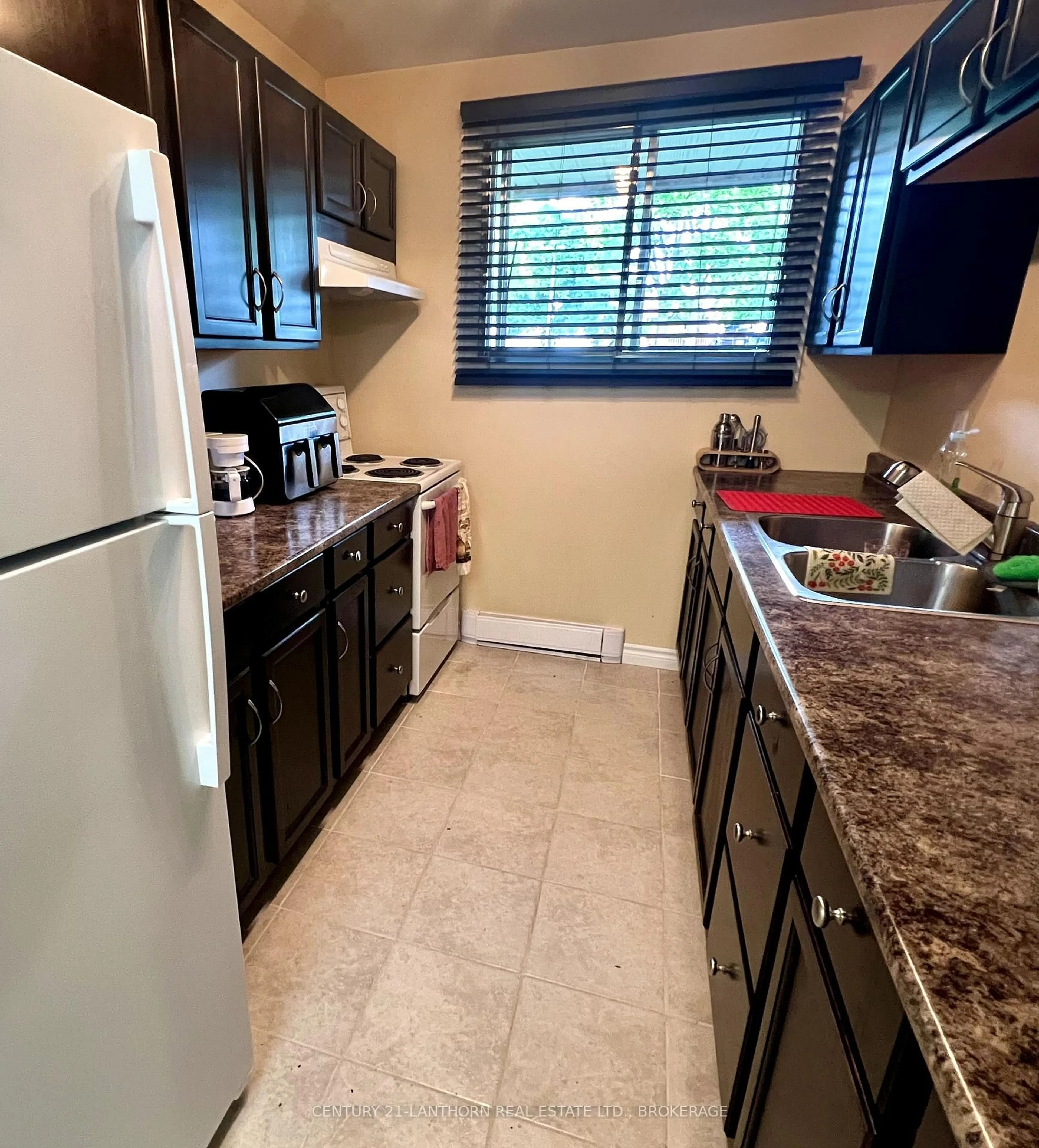 Standard kitchen, ceramic/tile floor for 845 Milford Dr #104, Kingston Ontario K7P 1A7