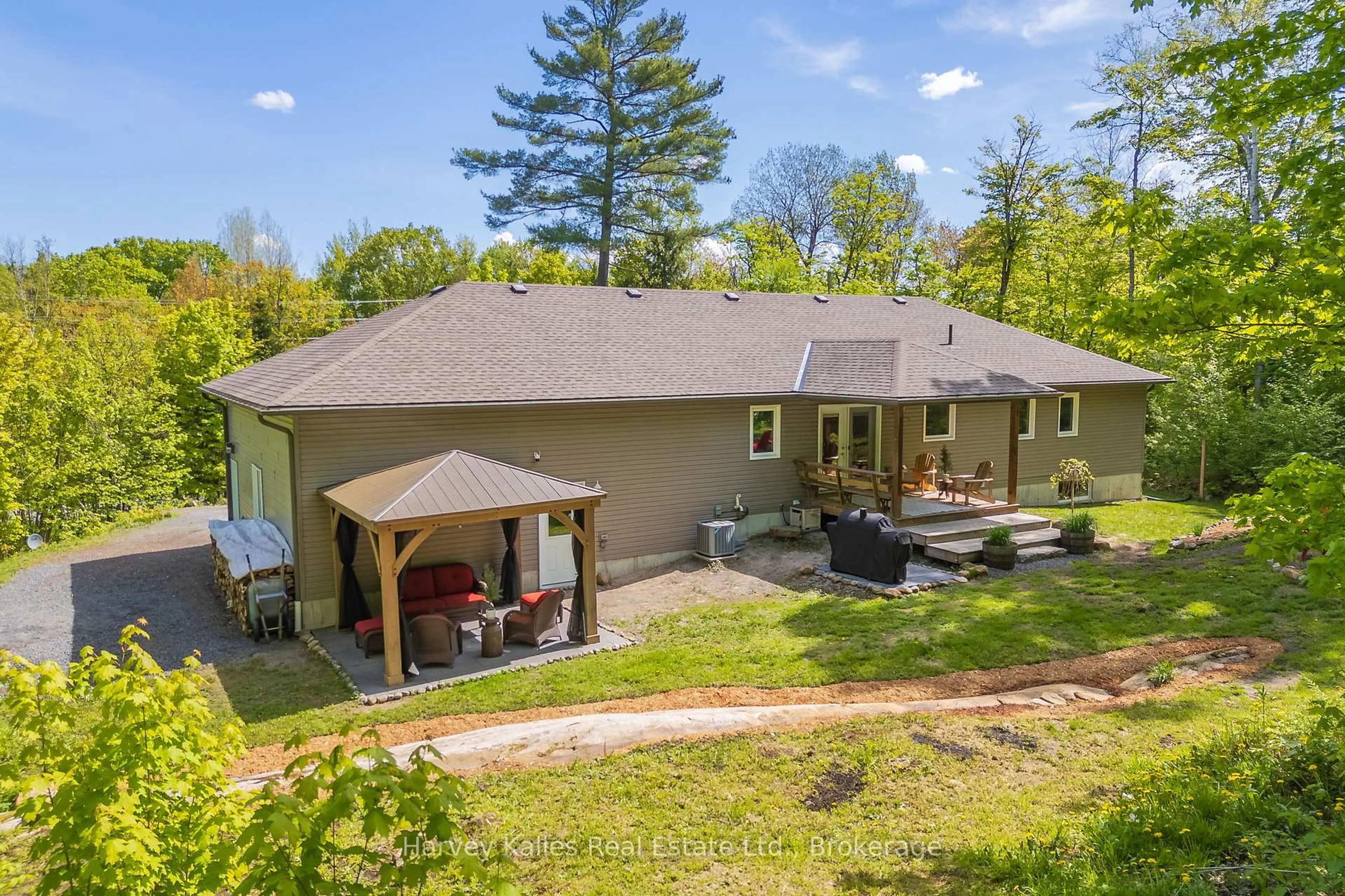 A pic from outside/outdoor area/front of a property/back of a property/a pic from drone, water/lake/river/ocean view for 142 Allensville Rd, Huntsville Ontario P0B 1M0