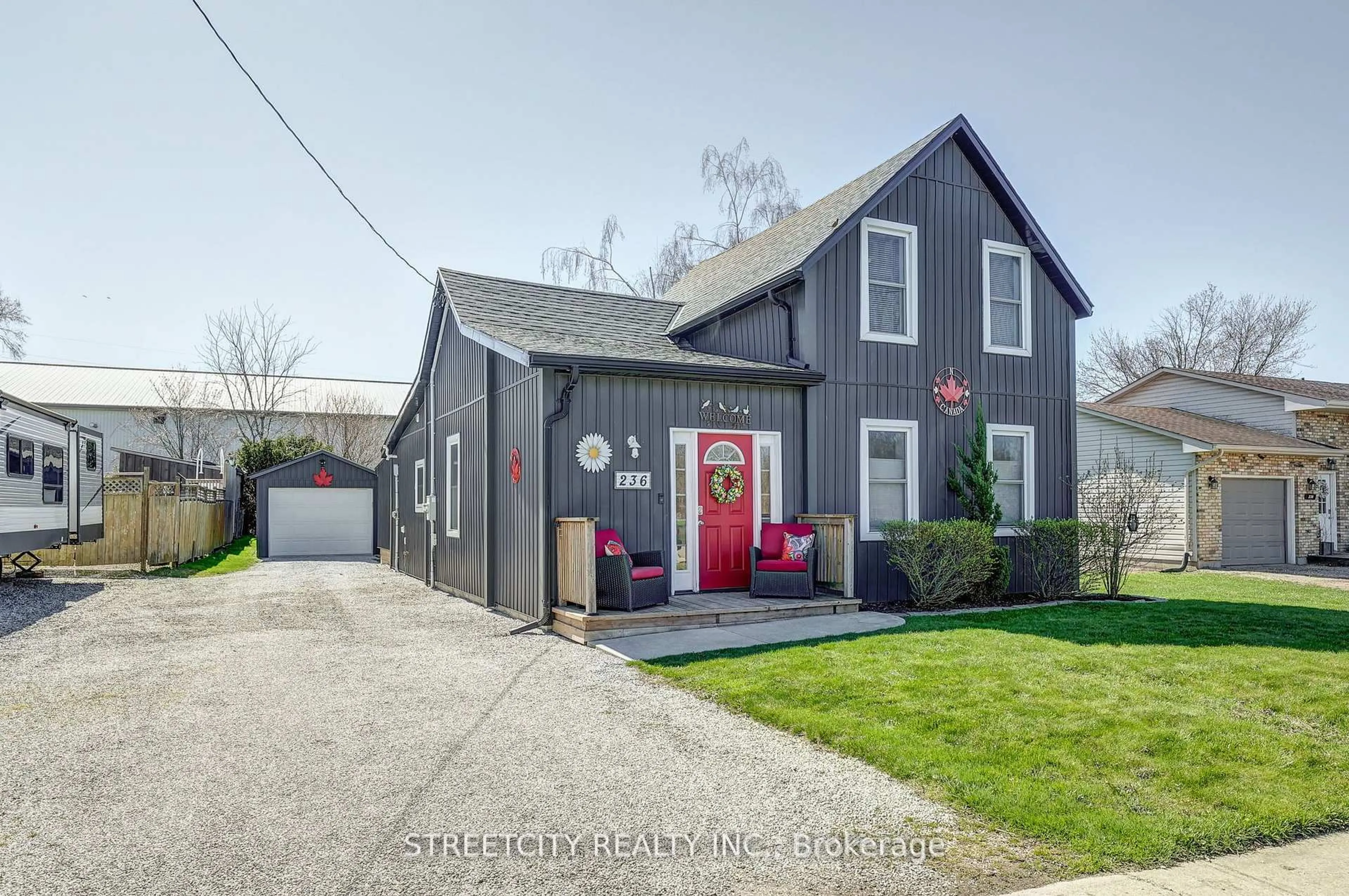 Home with vinyl exterior material, street for 236 Marsh Line, Dutton/Dunwich Ontario N0L 1J0