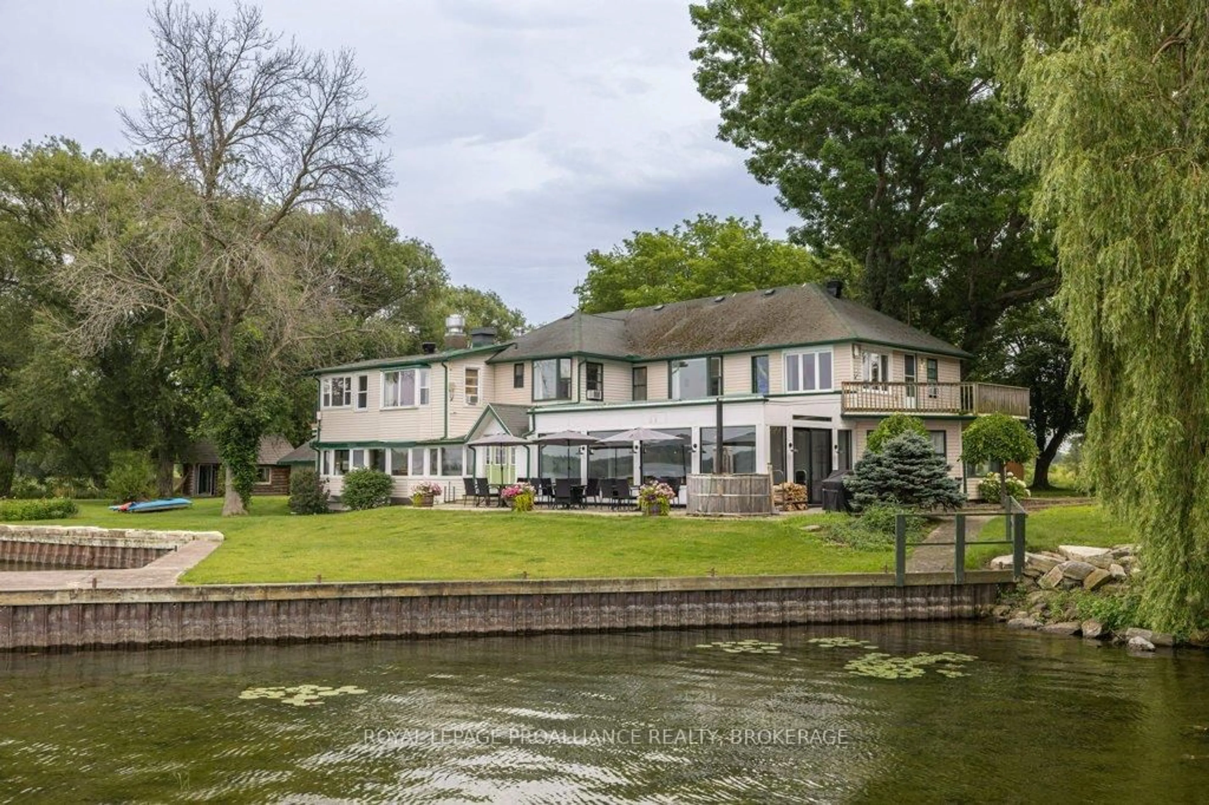 A pic from outside/outdoor area/front of a property/back of a property/a pic from drone, water/lake/river/ocean view for 89 WALDO'S WAY Lane, Wolfe Island Ontario K0H 2Y0