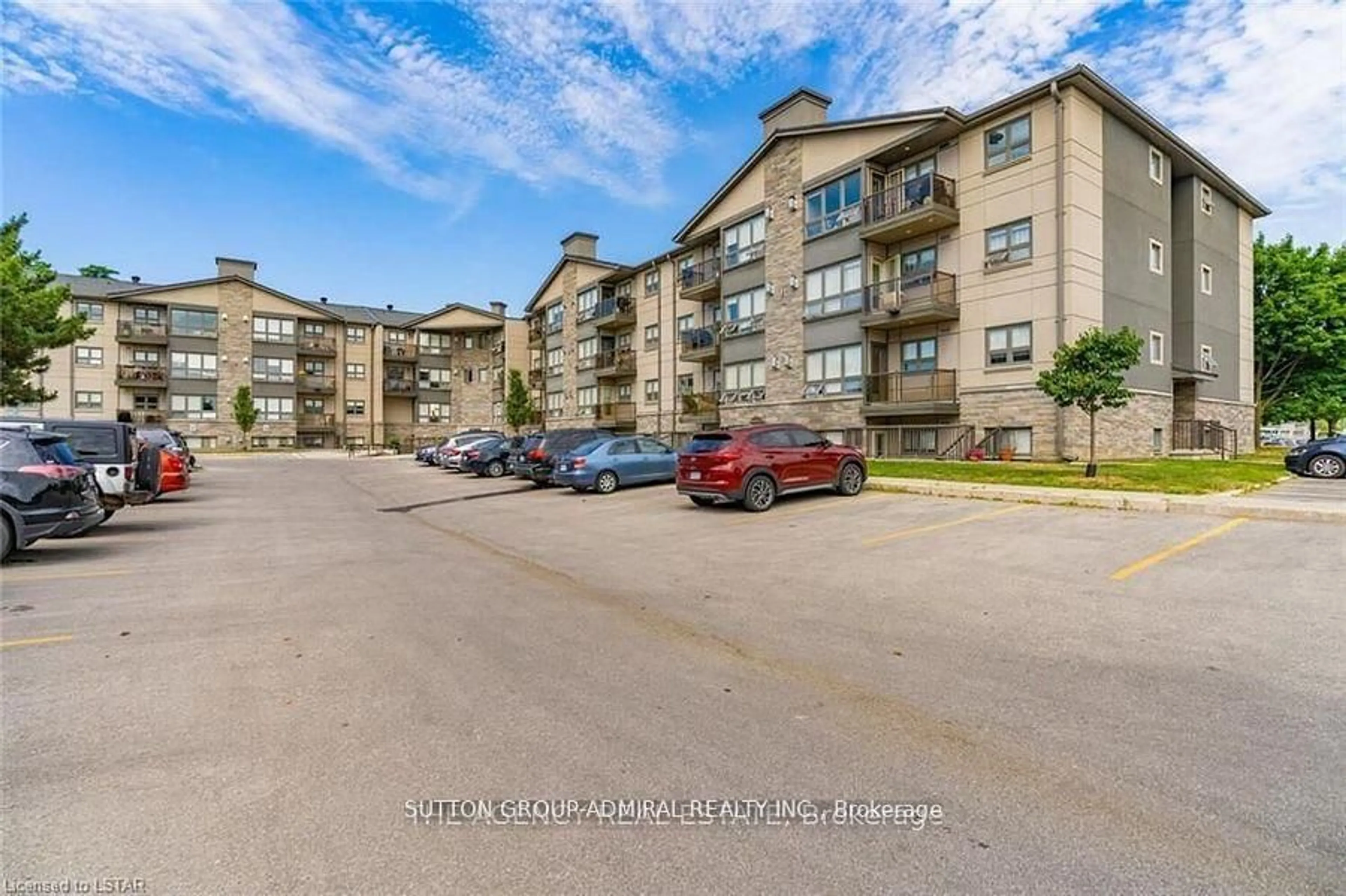 A pic from outside/outdoor area/front of a property/back of a property/a pic from drone, unknown for 5 Jacksway Cres #108, London North Ontario N5X 3T6