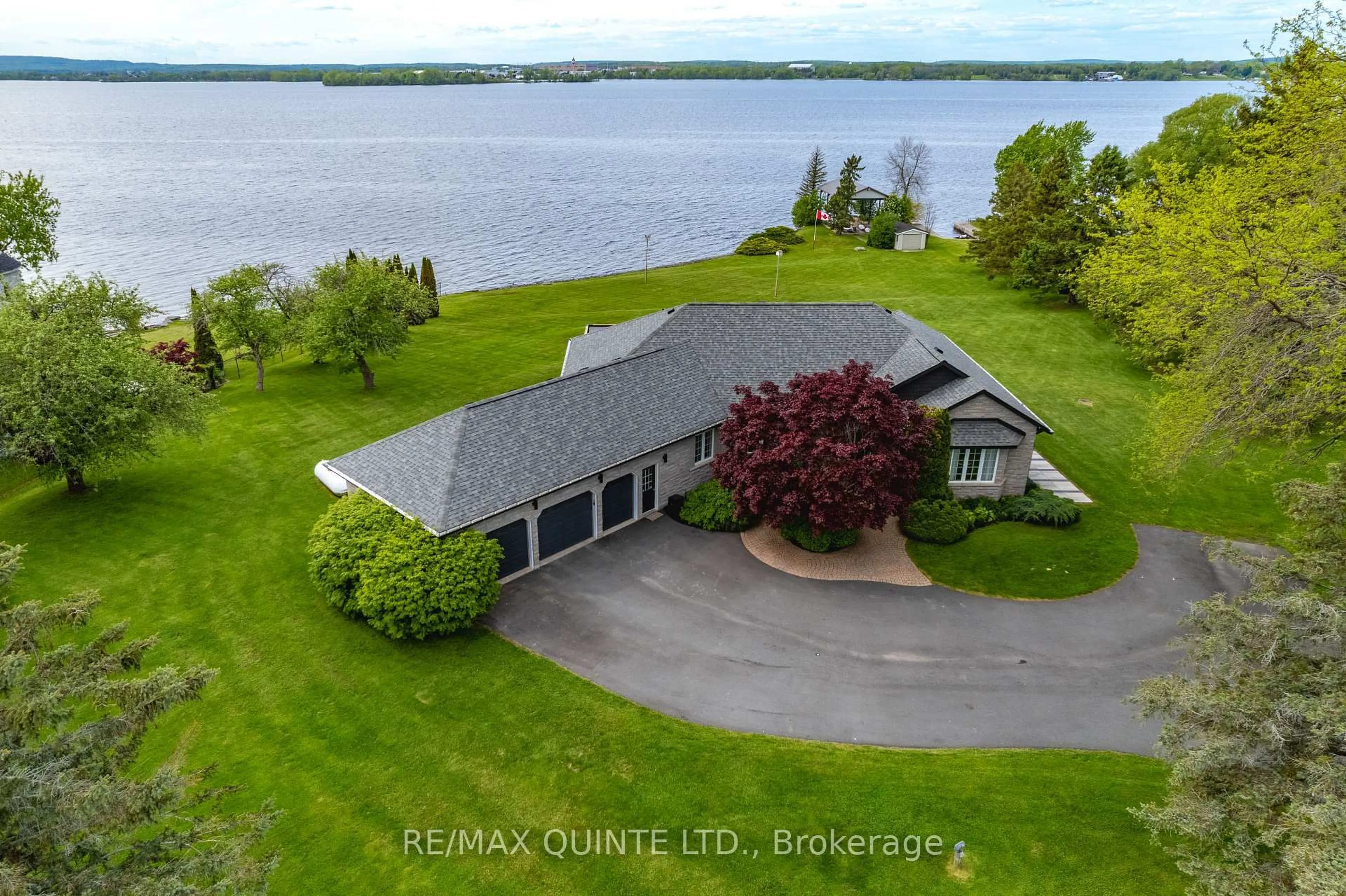 A pic from outside/outdoor area/front of a property/back of a property/a pic from drone, water/lake/river/ocean view for 2400 County Rd 3 N/A, Prince Edward County Ontario K0K 1L0