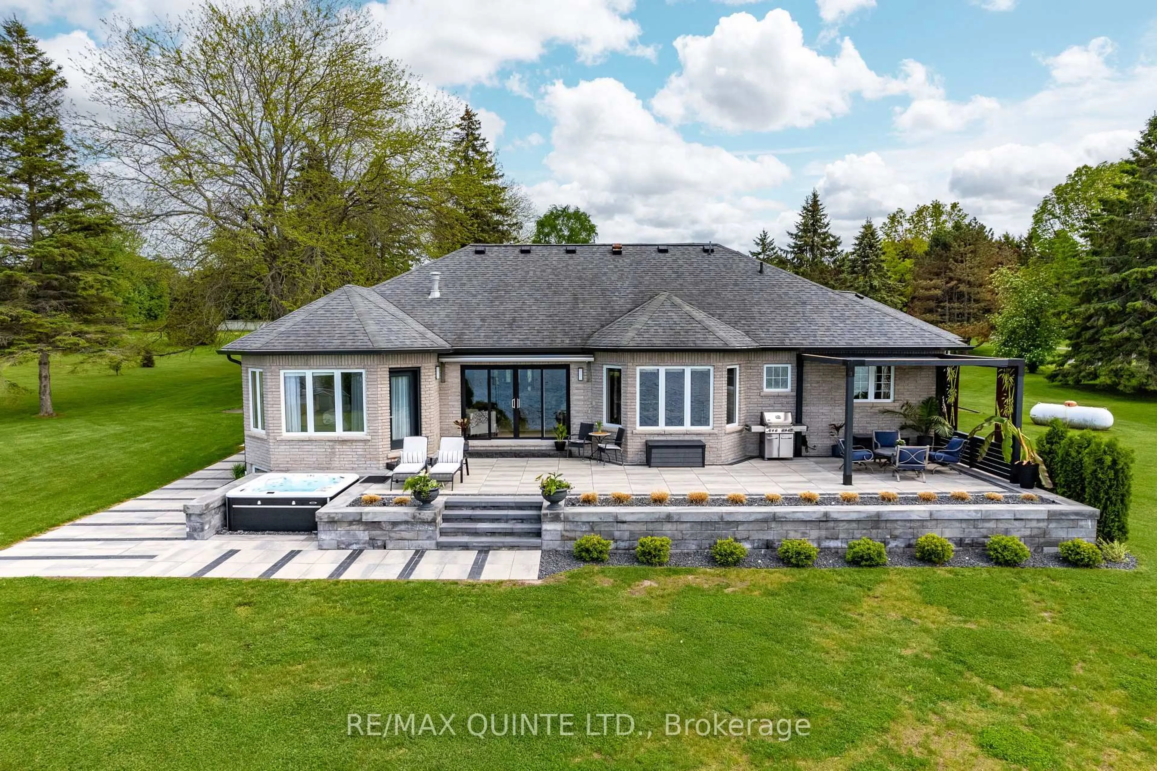A pic from outside/outdoor area/front of a property/back of a property/a pic from drone, water/lake/river/ocean view for 2400 County Rd 3 N/A, Prince Edward County Ontario K0K 1L0