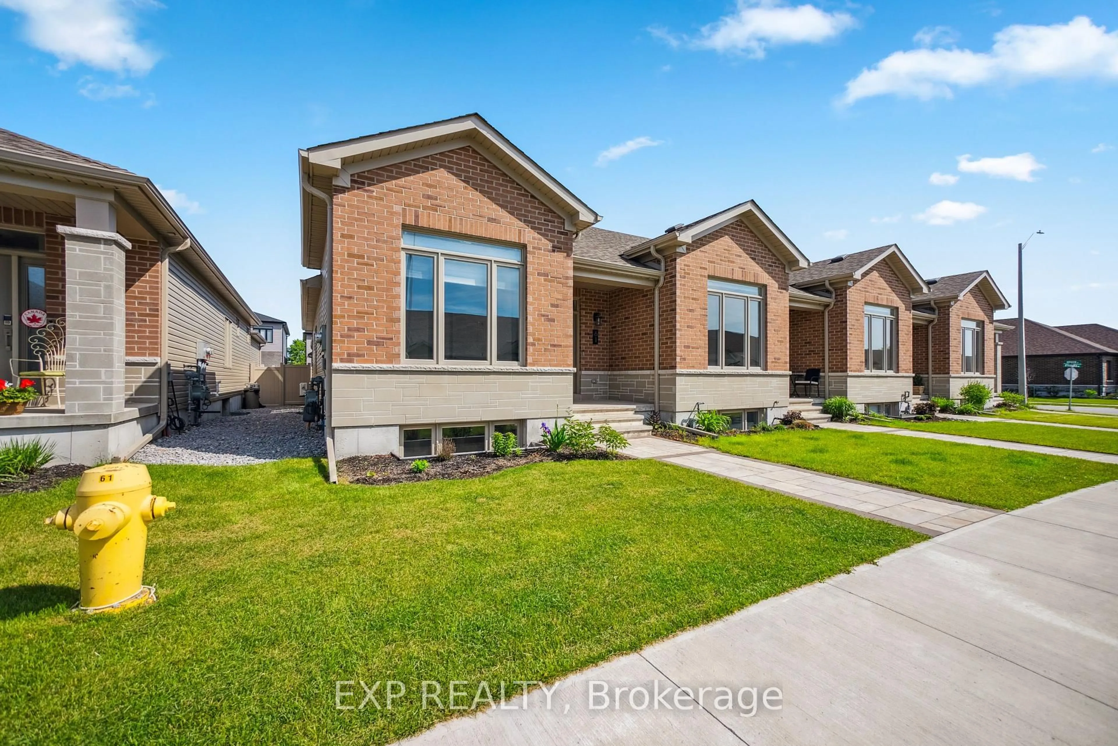 Home with brick exterior material, street for 61 Athabaska Dr, Belleville Ontario K8N 0T1