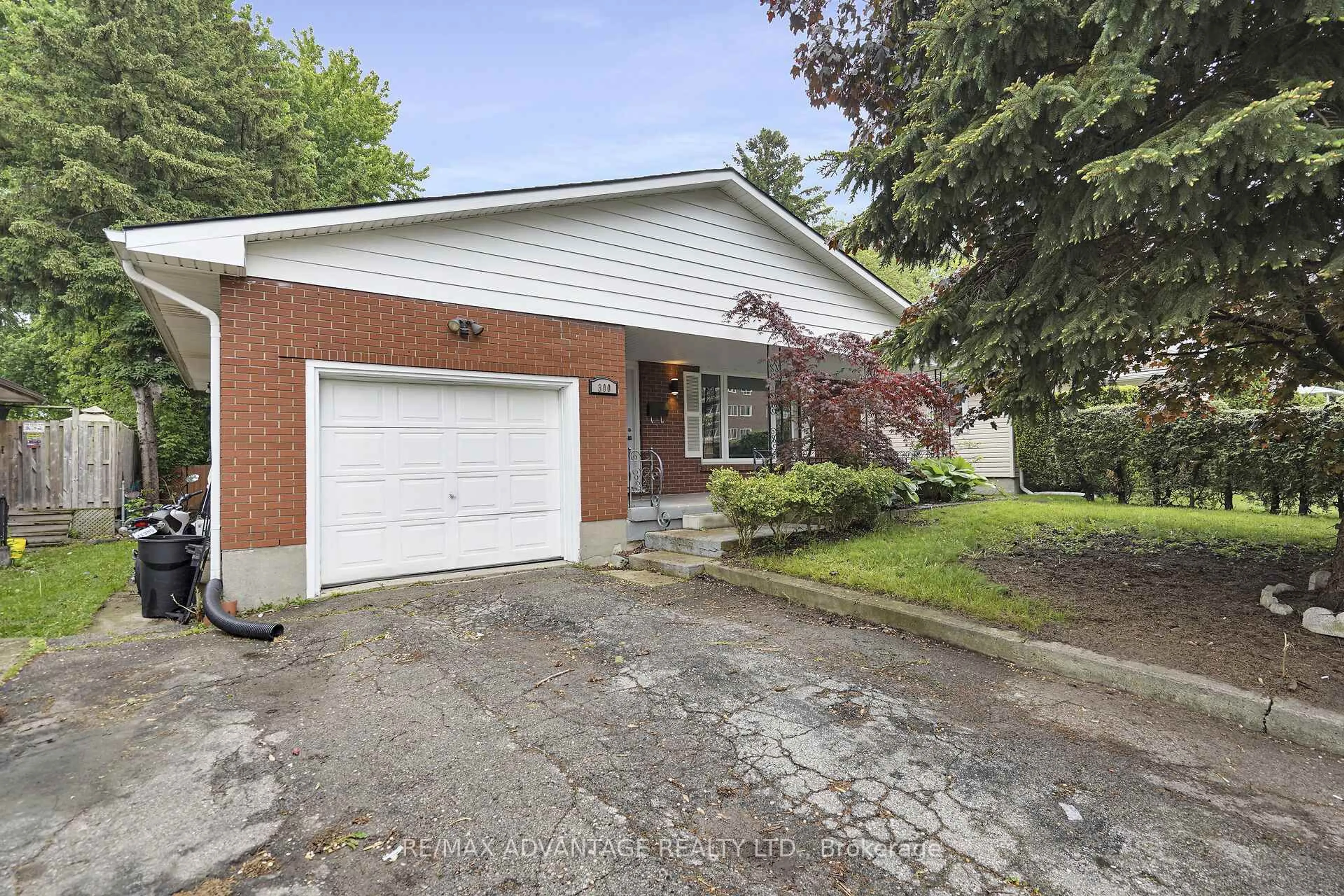 Home with brick exterior material, street for 300 Briarhill Ave, London East Ontario N5Y 1N8