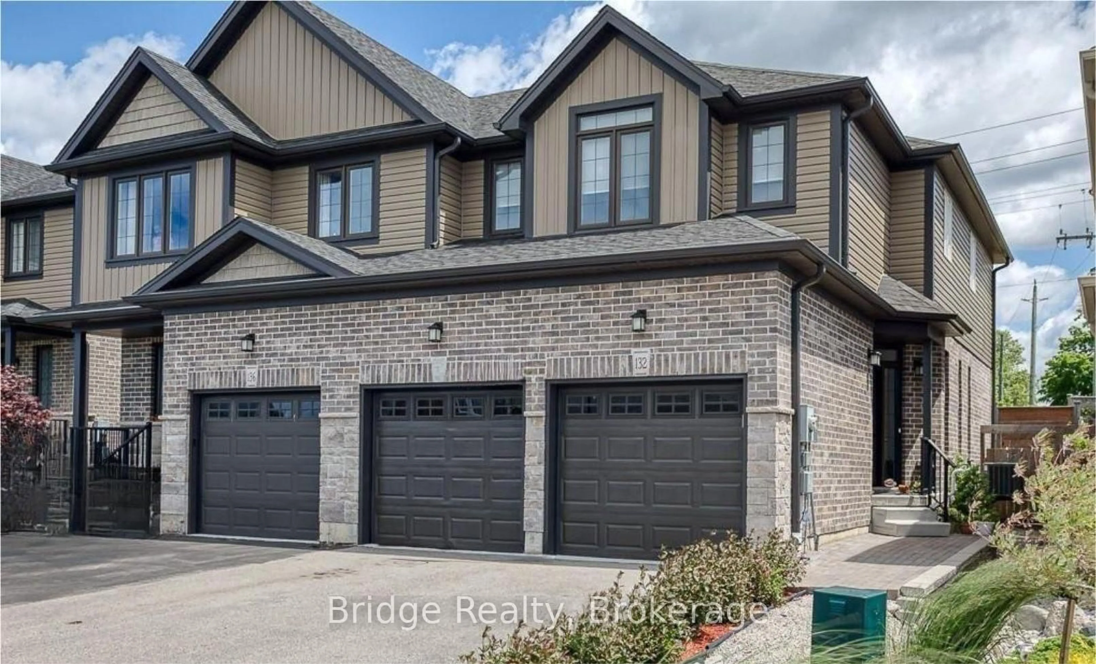 Home with brick exterior material, street for 132 WEDGEWOOD Dr, Woodstock Ontario N4T 0K1