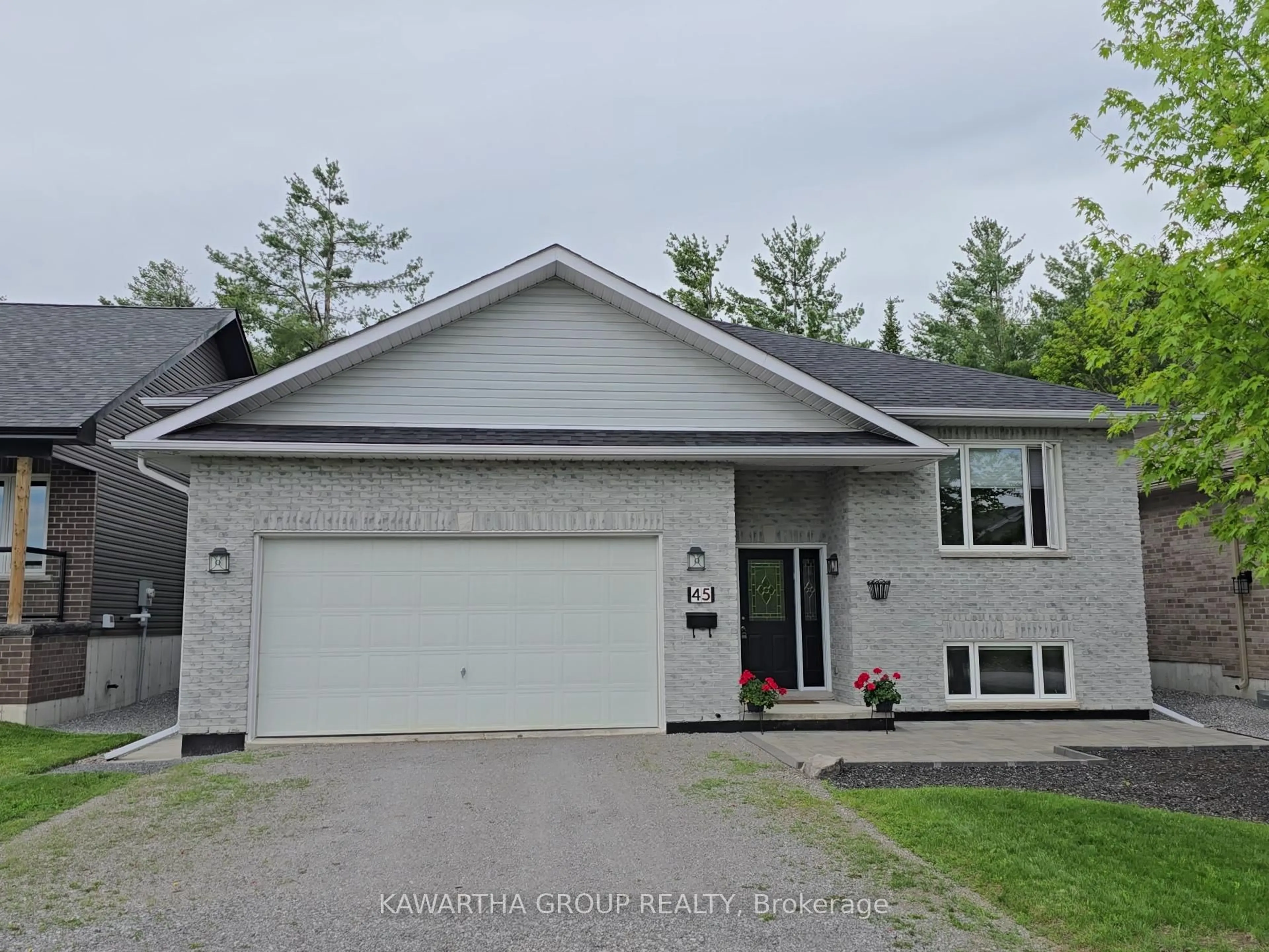 Home with vinyl exterior material, street for 45 Birch Cres, Kawartha Lakes Ontario K0M 1A0