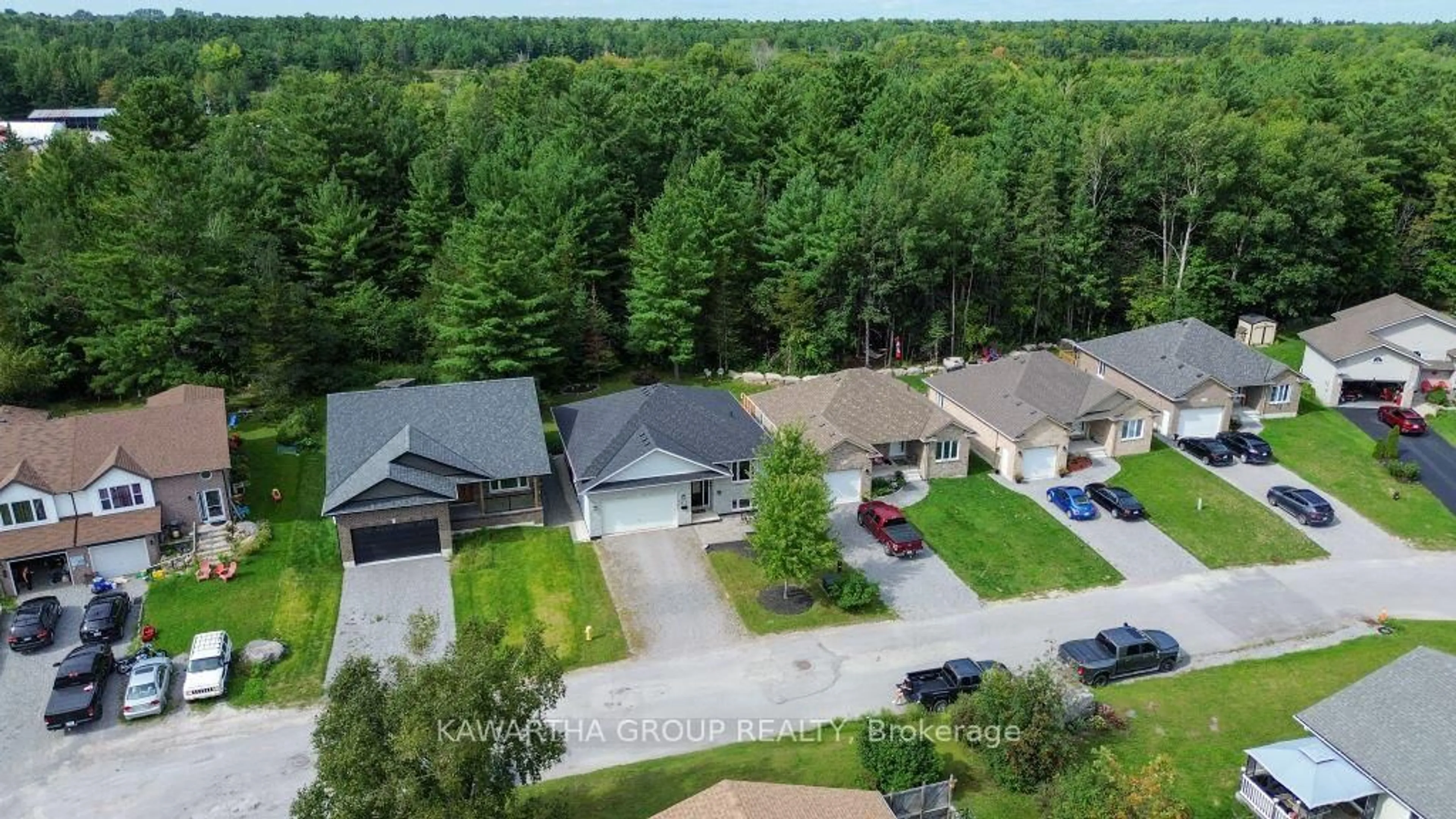 A pic from outside/outdoor area/front of a property/back of a property/a pic from drone, unknown for 45 Birch Cres, Kawartha Lakes Ontario K0M 1A0