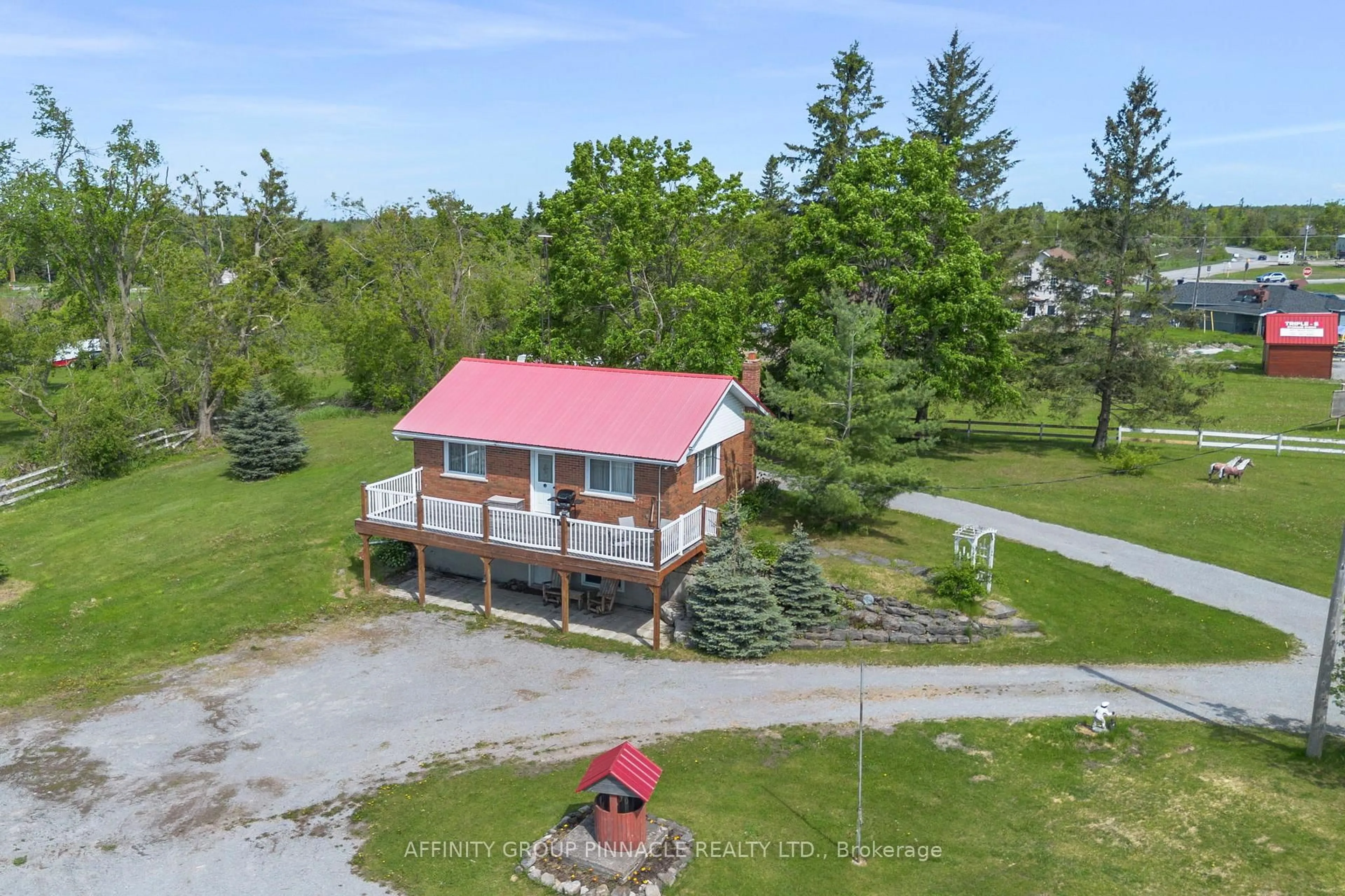 A pic from outside/outdoor area/front of a property/back of a property/a pic from drone, unknown for 572 County Rd 8 Rd, Kawartha Lakes Ontario K0M 1N0