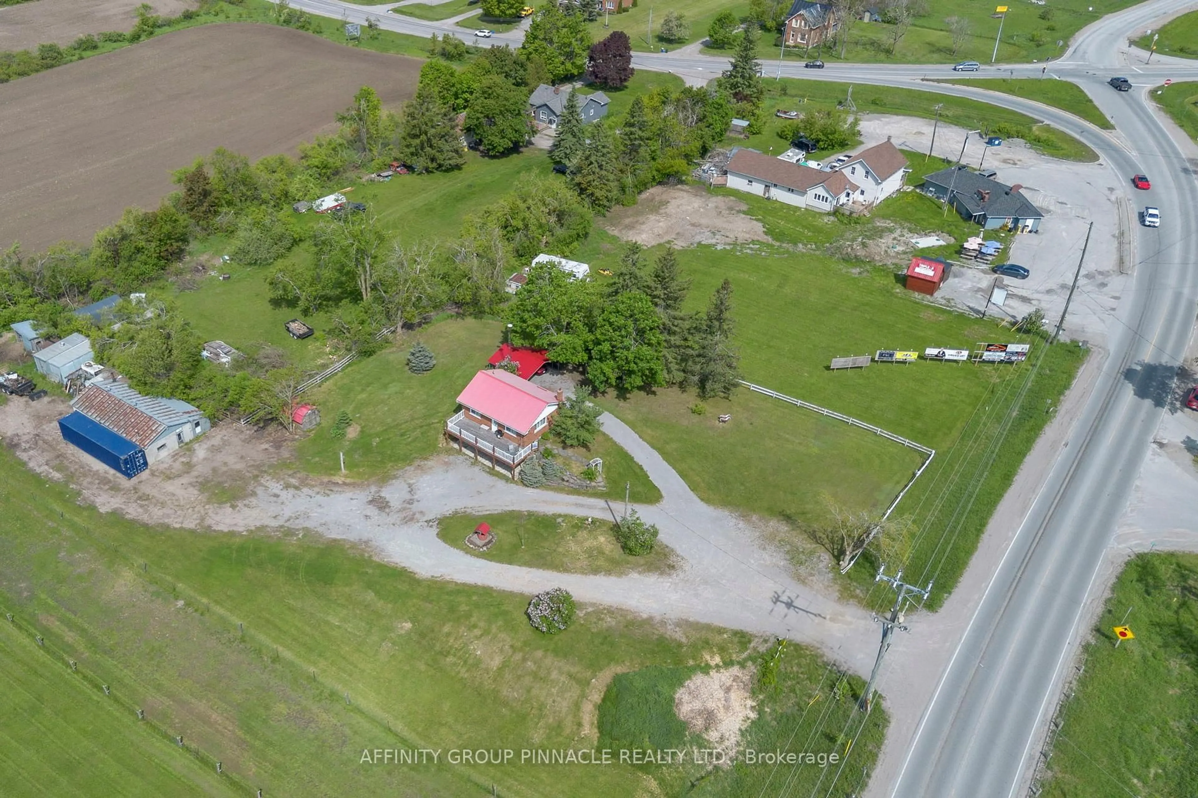 A pic from outside/outdoor area/front of a property/back of a property/a pic from drone, street for 572 County Rd 8 Rd, Kawartha Lakes Ontario K0M 1N0