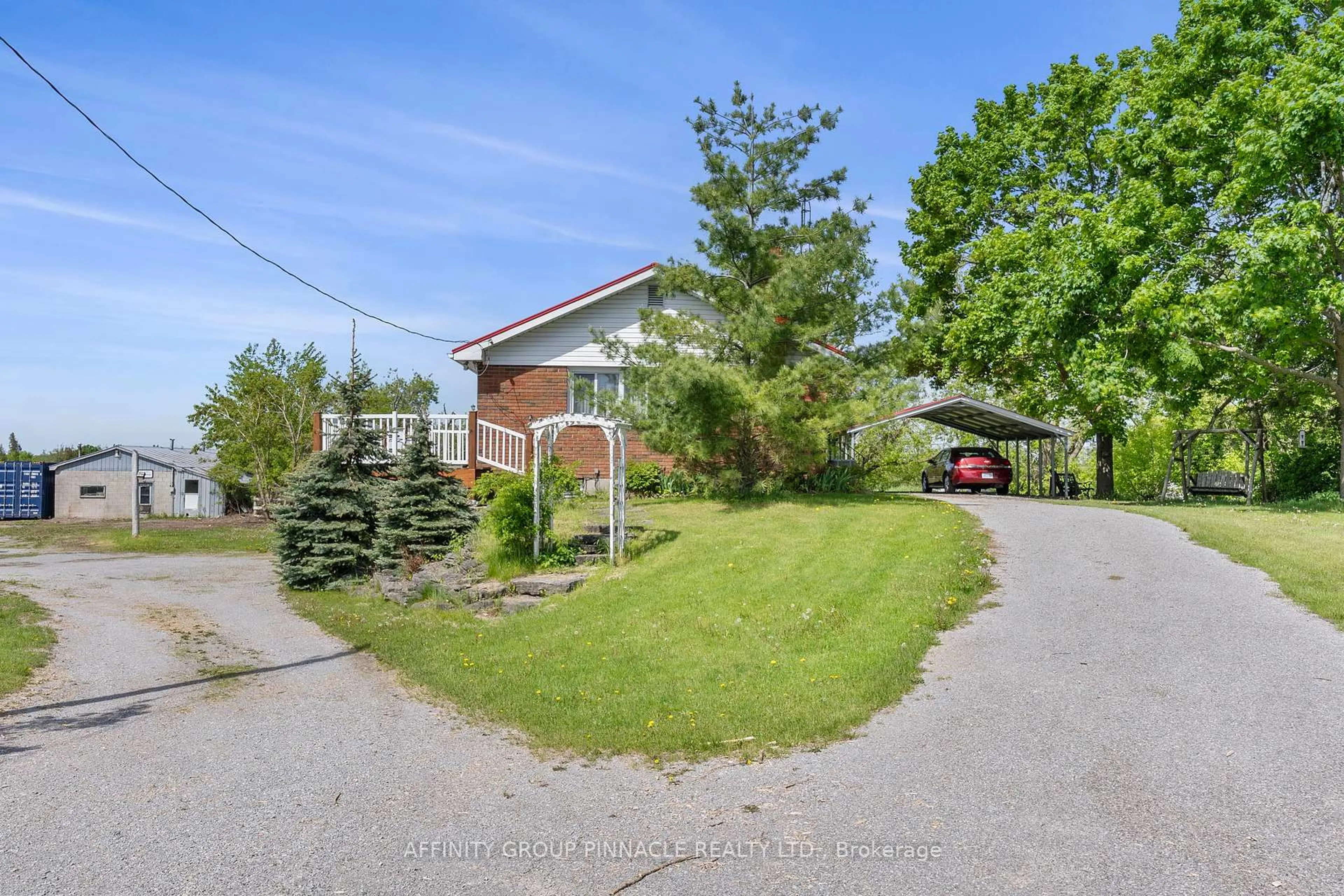 A pic from outside/outdoor area/front of a property/back of a property/a pic from drone, street for 572 County Rd 8 Rd, Kawartha Lakes Ontario K0M 1N0