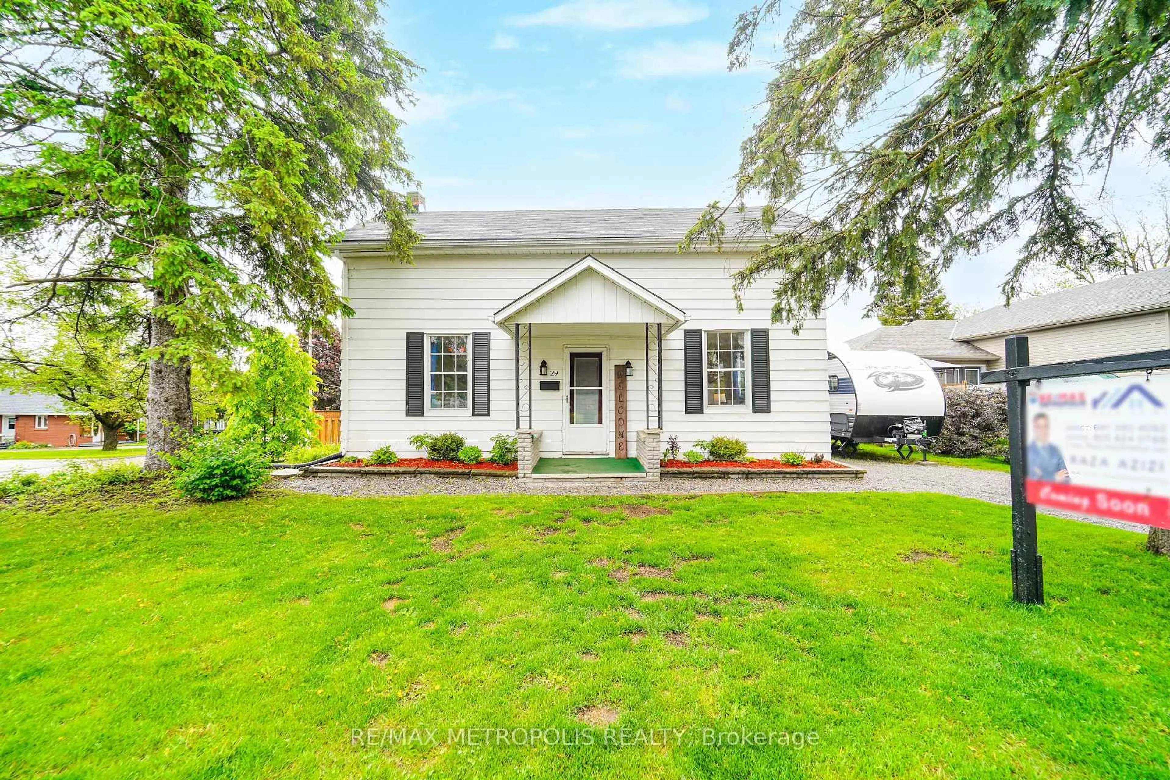 Home with vinyl exterior material, street for 29 George St, Kawartha Lakes Ontario K9V 1W4