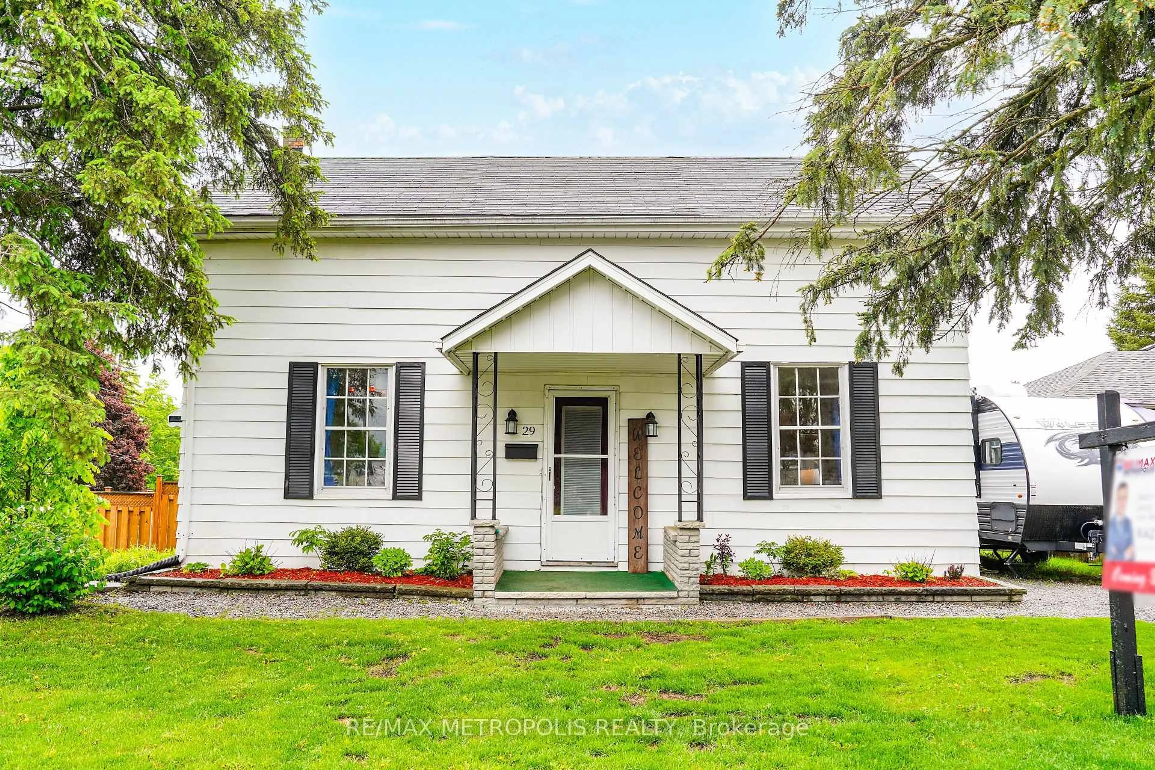 Home with vinyl exterior material, street for 29 George St, Kawartha Lakes Ontario K9V 1W4