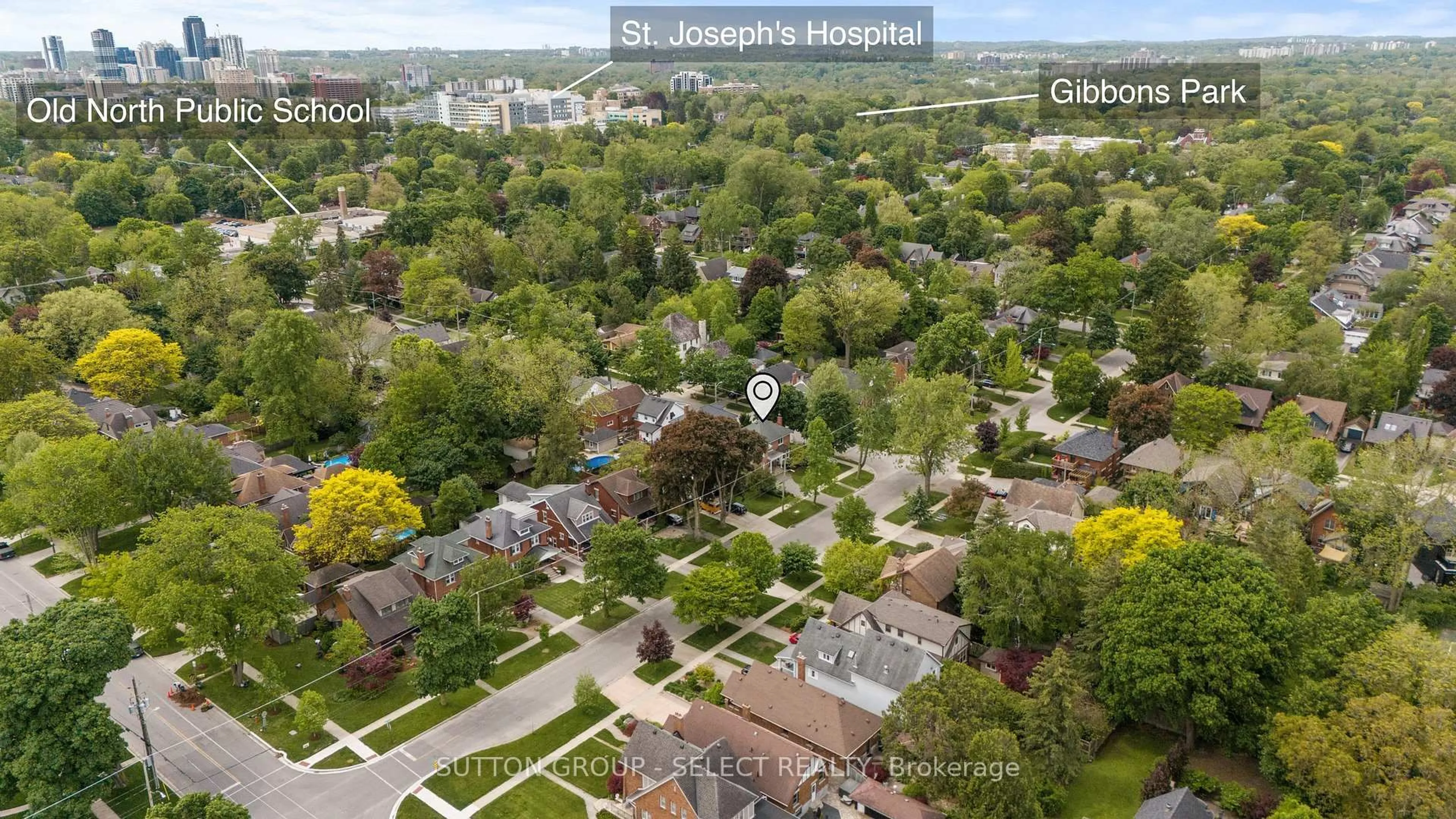 A pic from outside/outdoor area/front of a property/back of a property/a pic from drone, street for 391 Regent St, London East Ontario N6A 2H7
