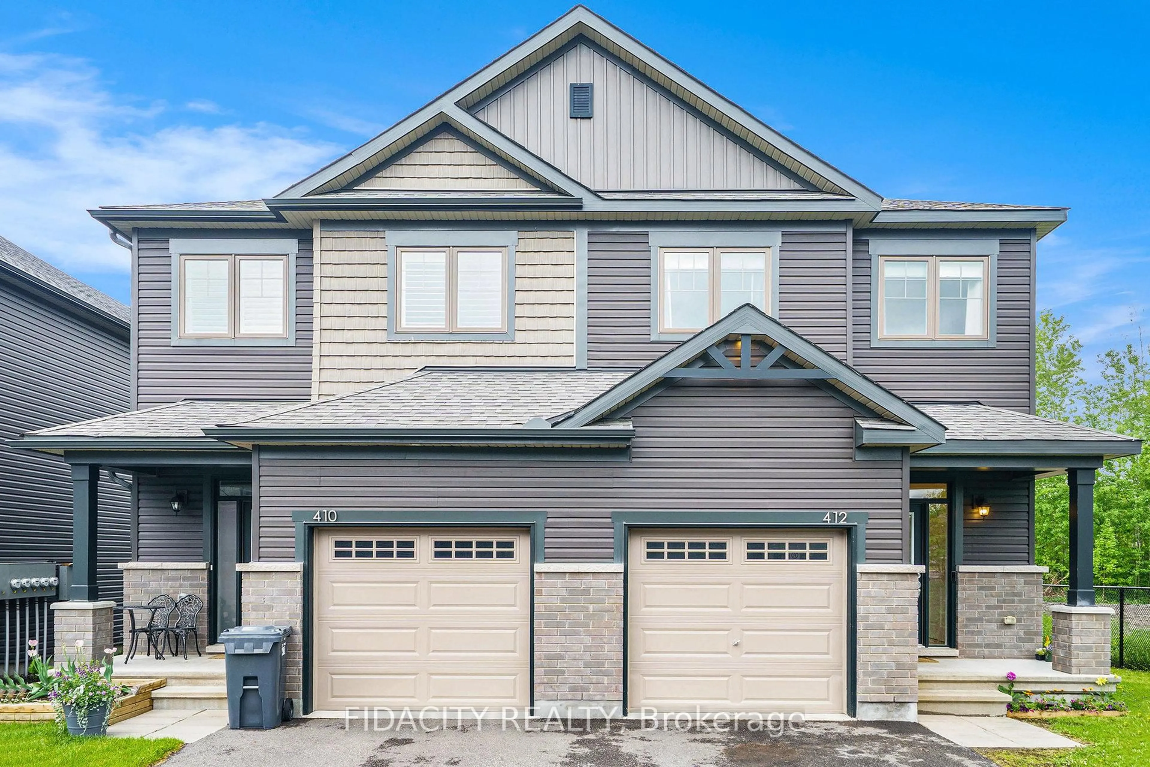 Home with vinyl exterior material, street for 412 Allee Premiere Lane, Clarence-Rockland Ontario K4K 0M7