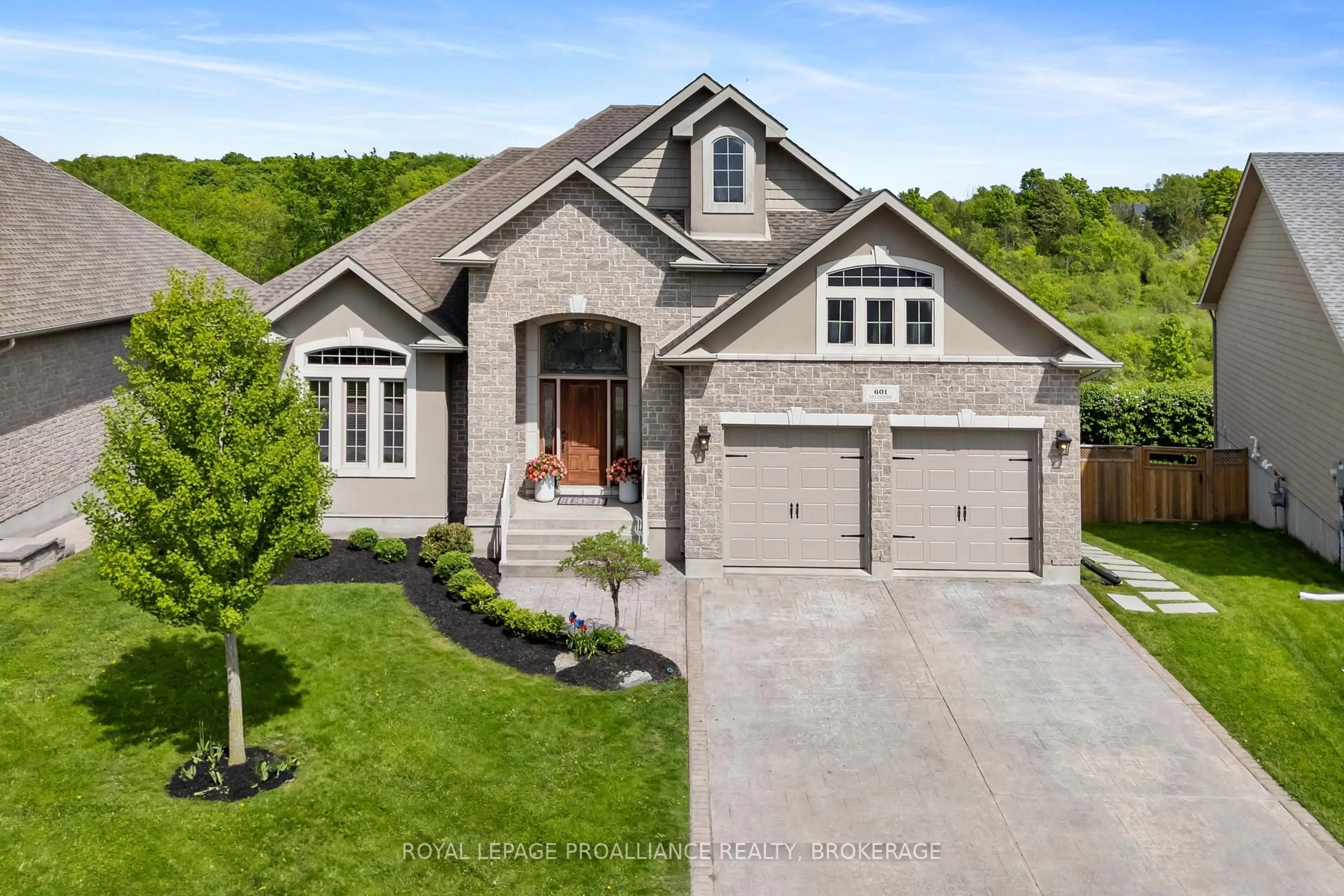 Home with brick exterior material, street for 601 Fieldstone Dr, Kingston Ontario K7K 0B9