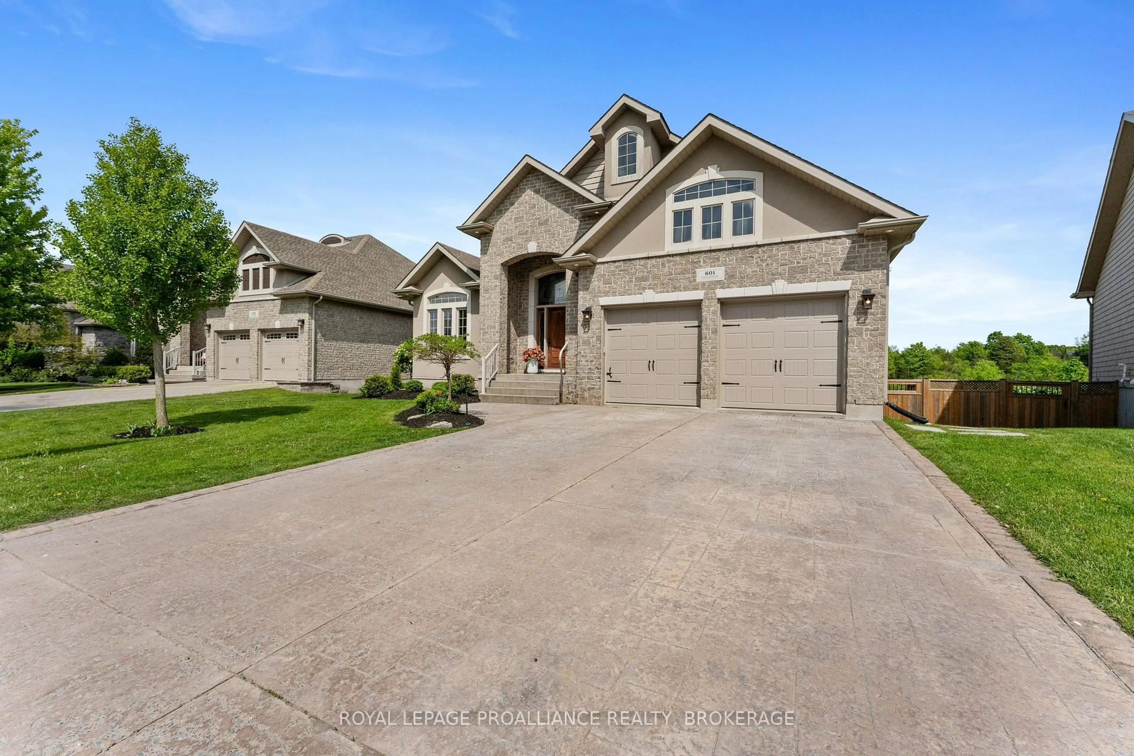 Home with brick exterior material, street for 601 Fieldstone Dr, Kingston Ontario K7K 0B9
