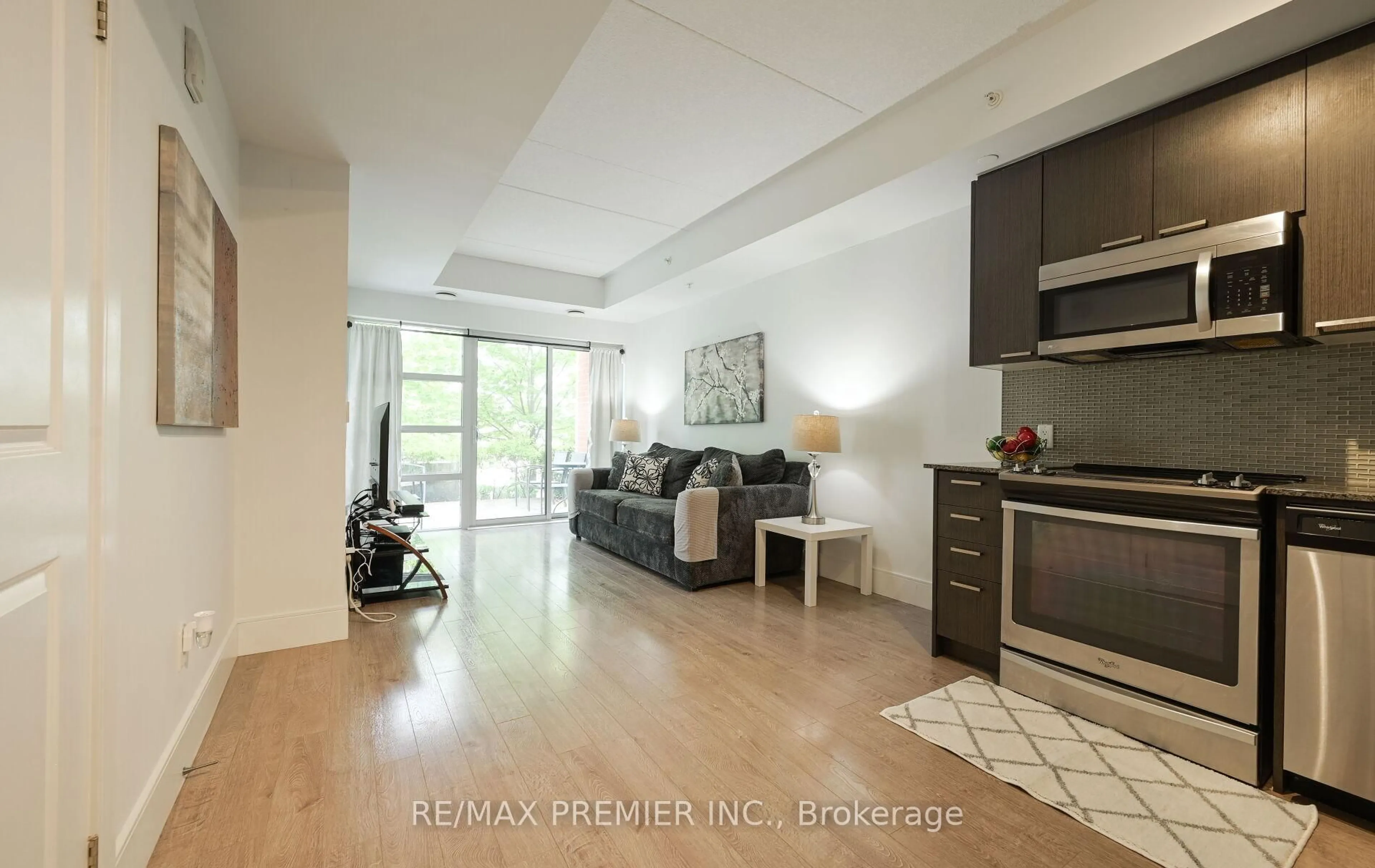 Living room with furniture, unknown for 155 St Leger St #115, Kitchener Ontario N2H 0B9