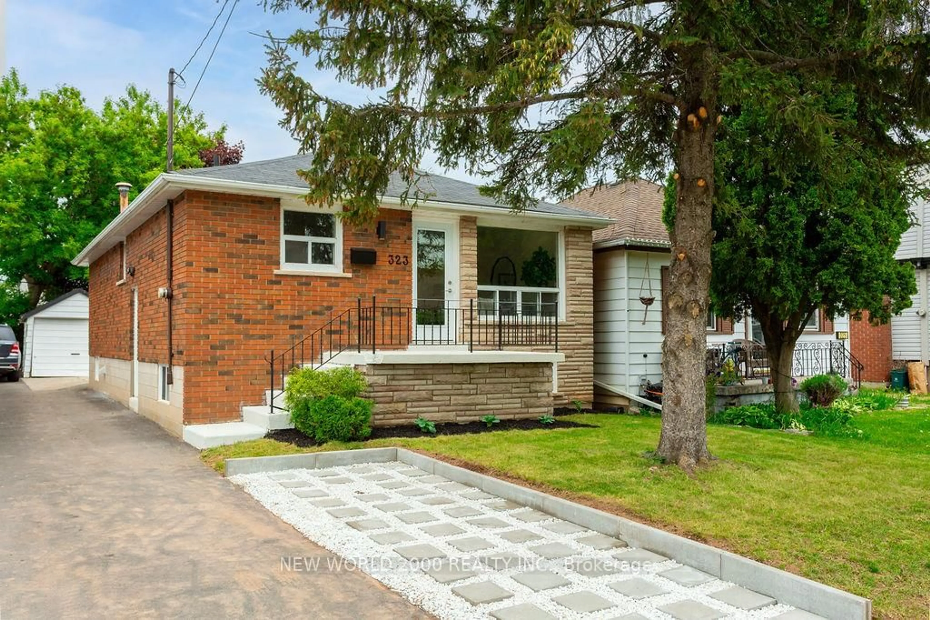 Home with brick exterior material, street for 323 Brunswick St, Hamilton Ontario L8H 6R8