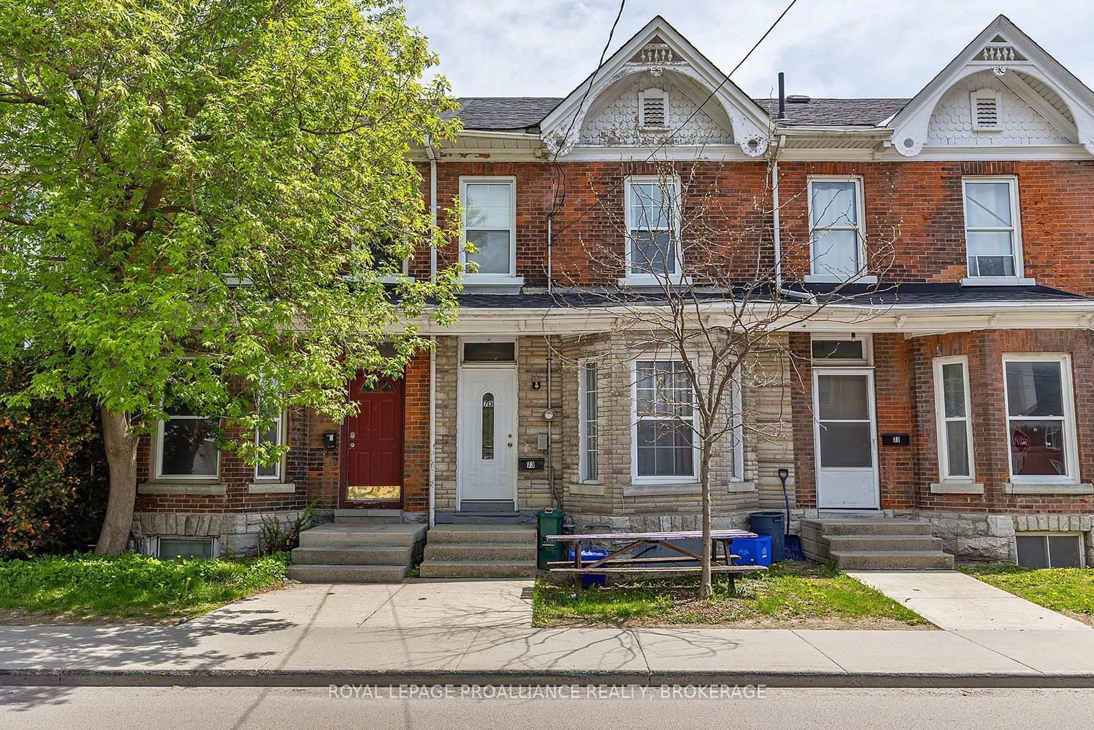 Home with brick exterior material, street for 73 Division St, Kingston Ontario K7M 3M1
