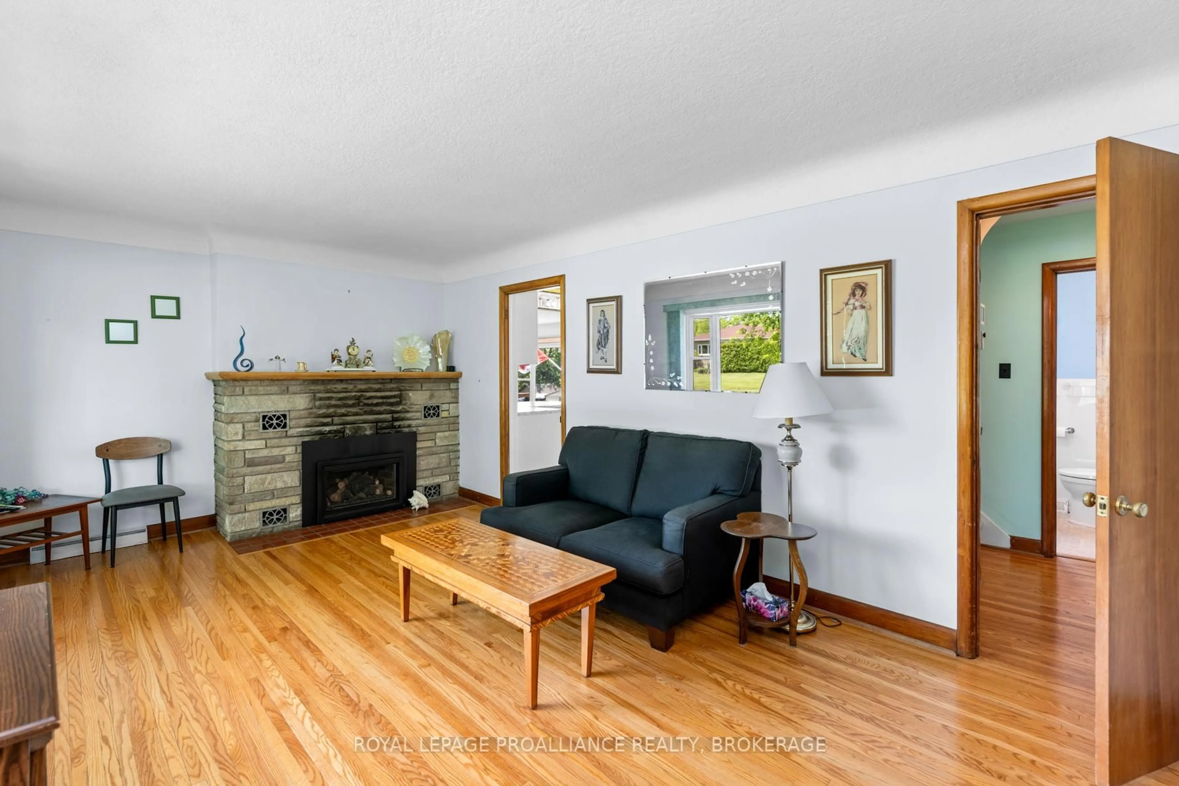 Living room with furniture, wood/laminate floor for 1761 Floyd Ave, Kingston Ontario K7L 4V4