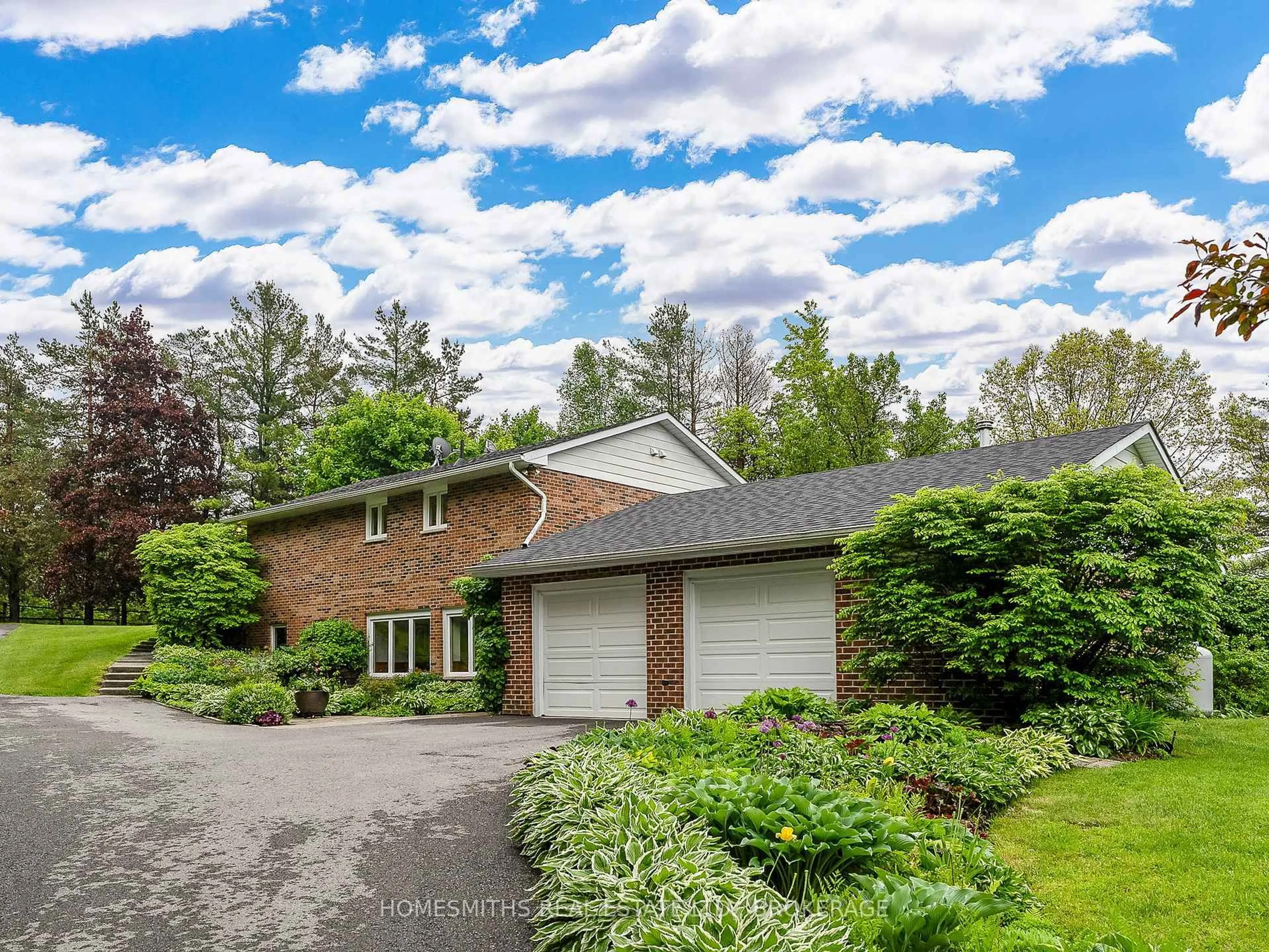 A pic from outside/outdoor area/front of a property/back of a property/a pic from drone, street for 9091 Rose Rd, Hamilton Township Ontario K9A 4J9