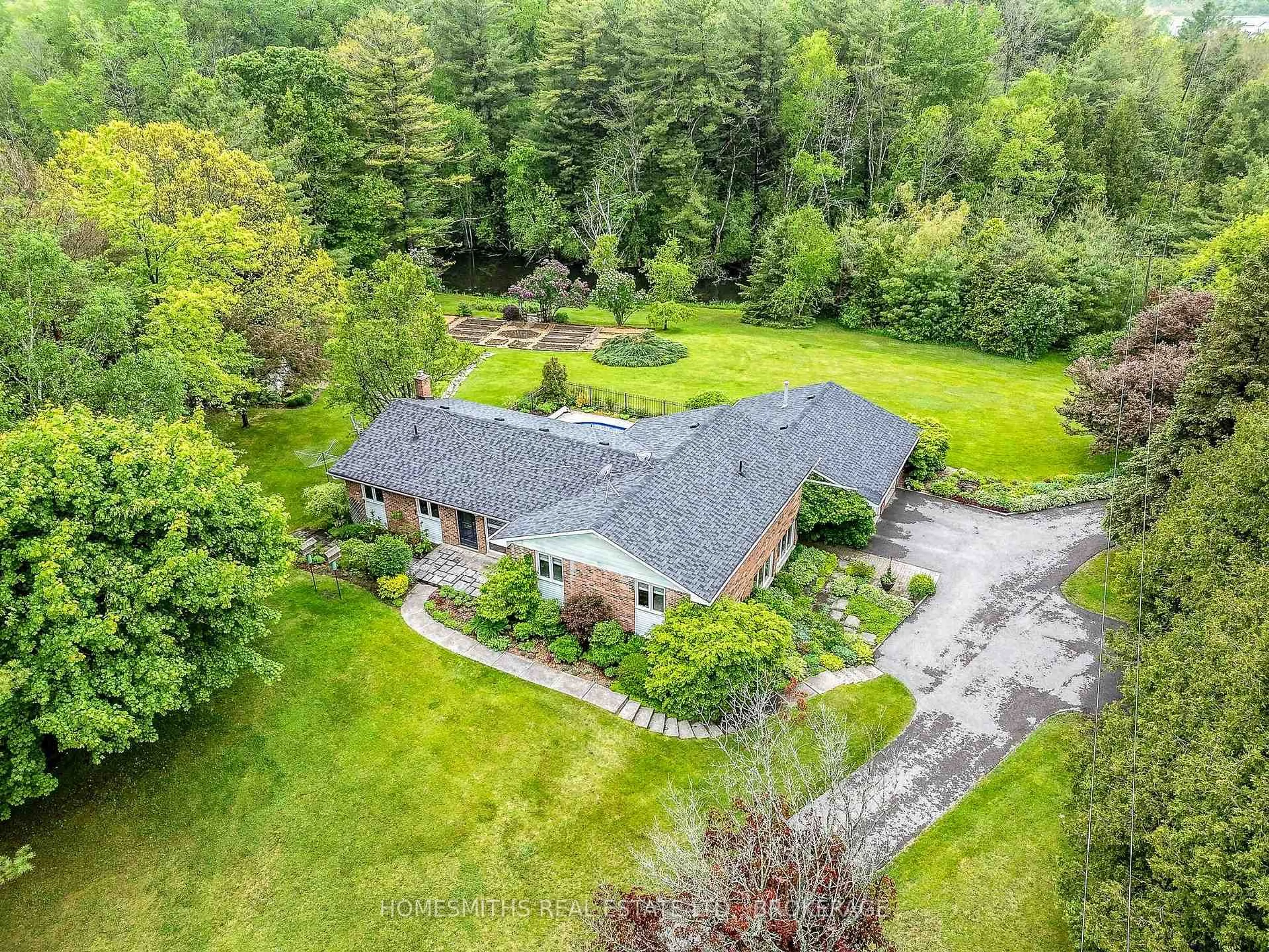 A pic from outside/outdoor area/front of a property/back of a property/a pic from drone, unknown for 9091 Rose Rd, Hamilton Township Ontario K9A 4J9