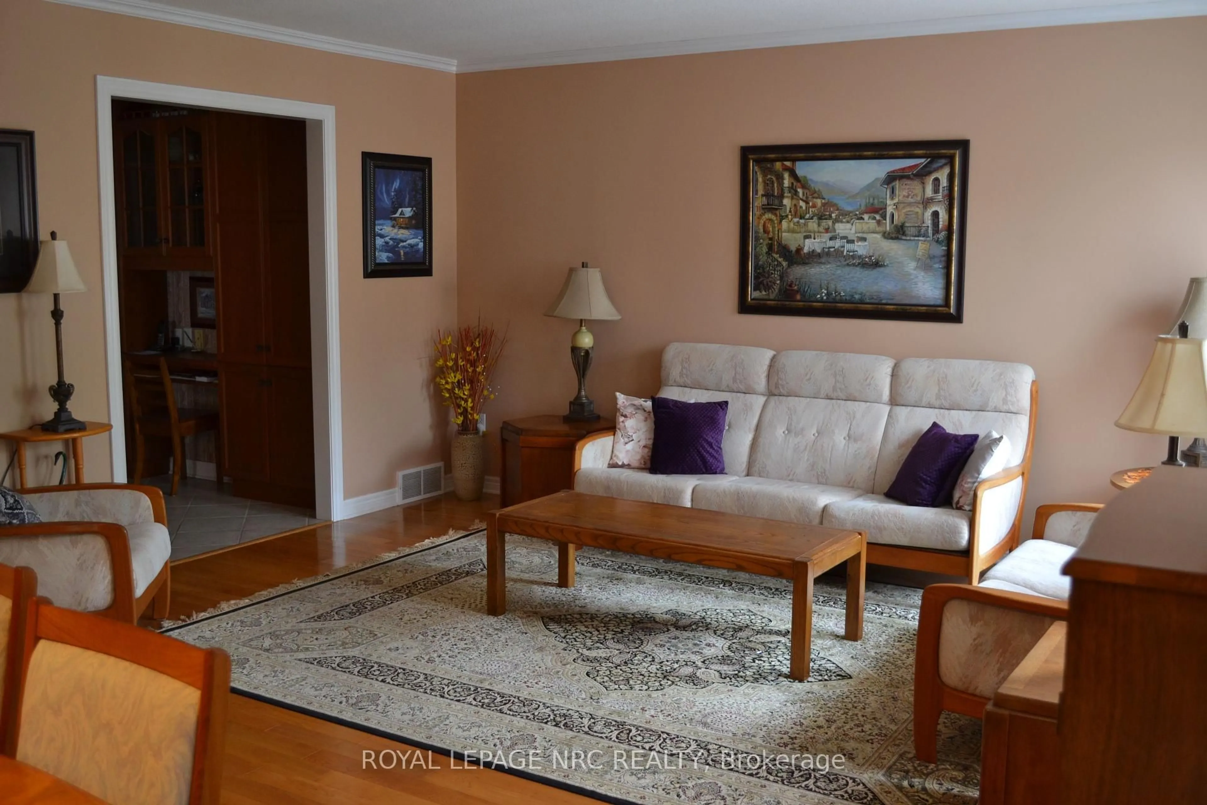 Living room with furniture, wood/laminate floor for 484 Balsam St, Welland Ontario L3C 7G8