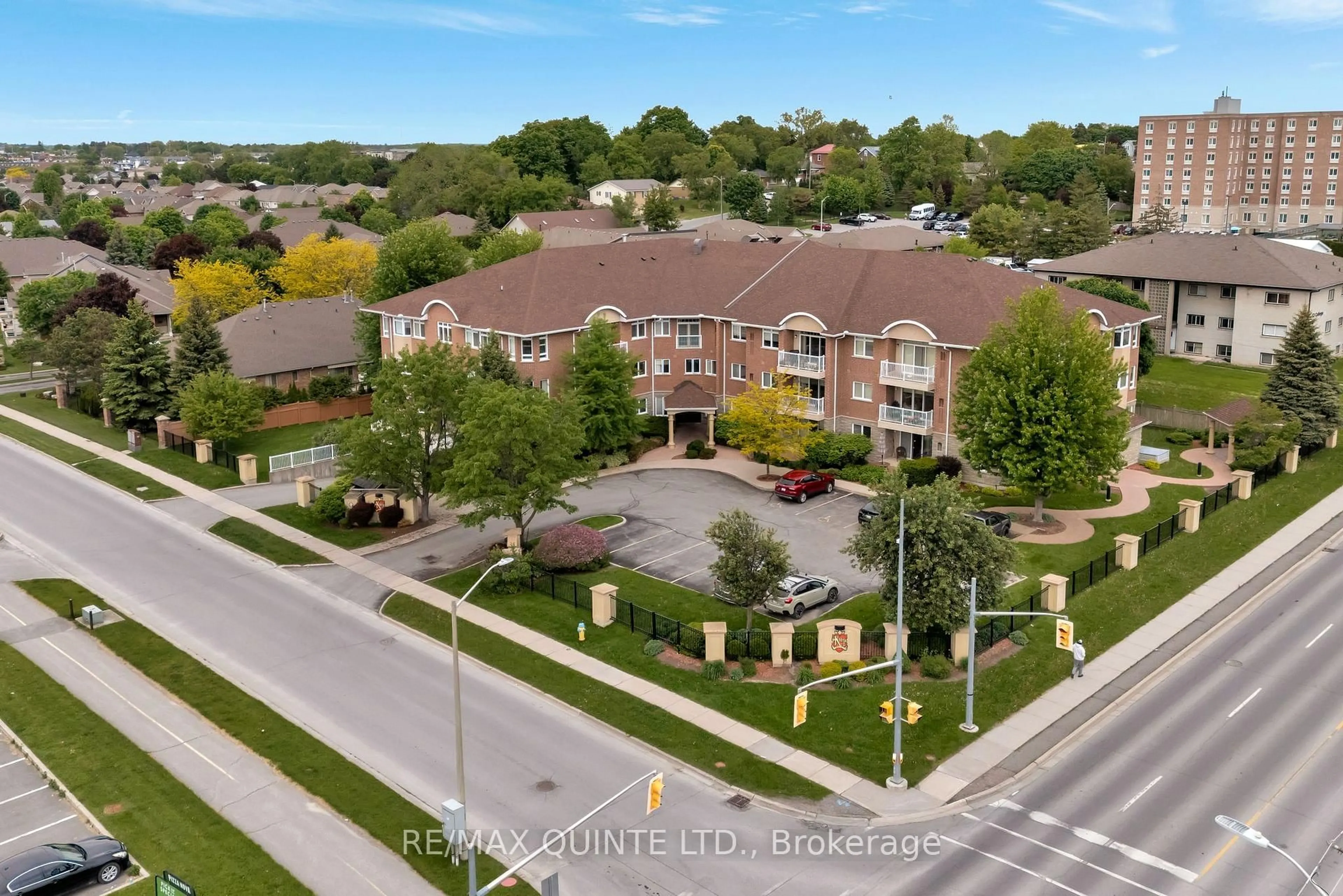 A pic from outside/outdoor area/front of a property/back of a property/a pic from drone, street for 15 Heartwood Dr #204, Belleville Ontario K8P 5P4