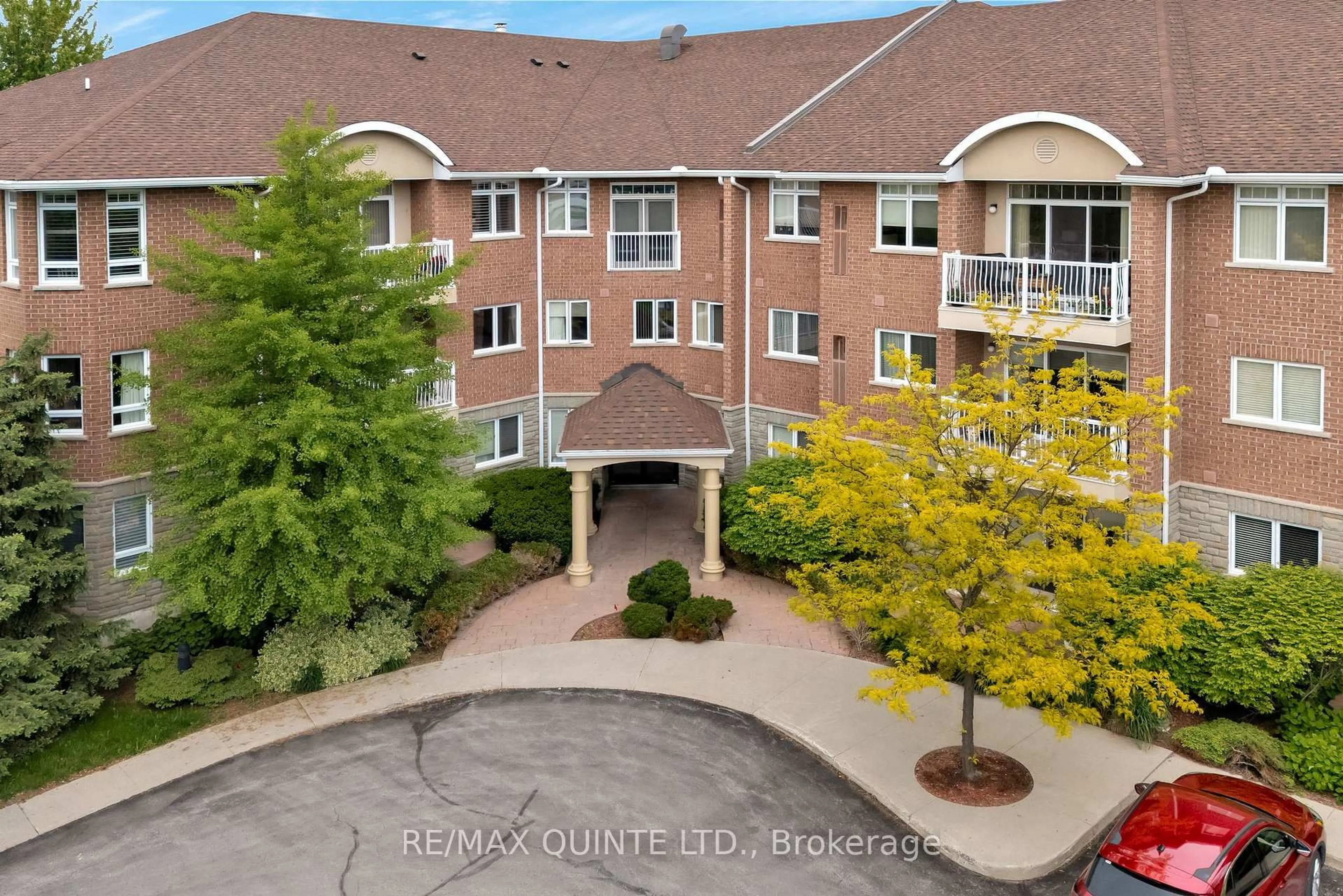 A pic from outside/outdoor area/front of a property/back of a property/a pic from drone, unknown for 15 Heartwood Dr #204, Belleville Ontario K8P 5P4