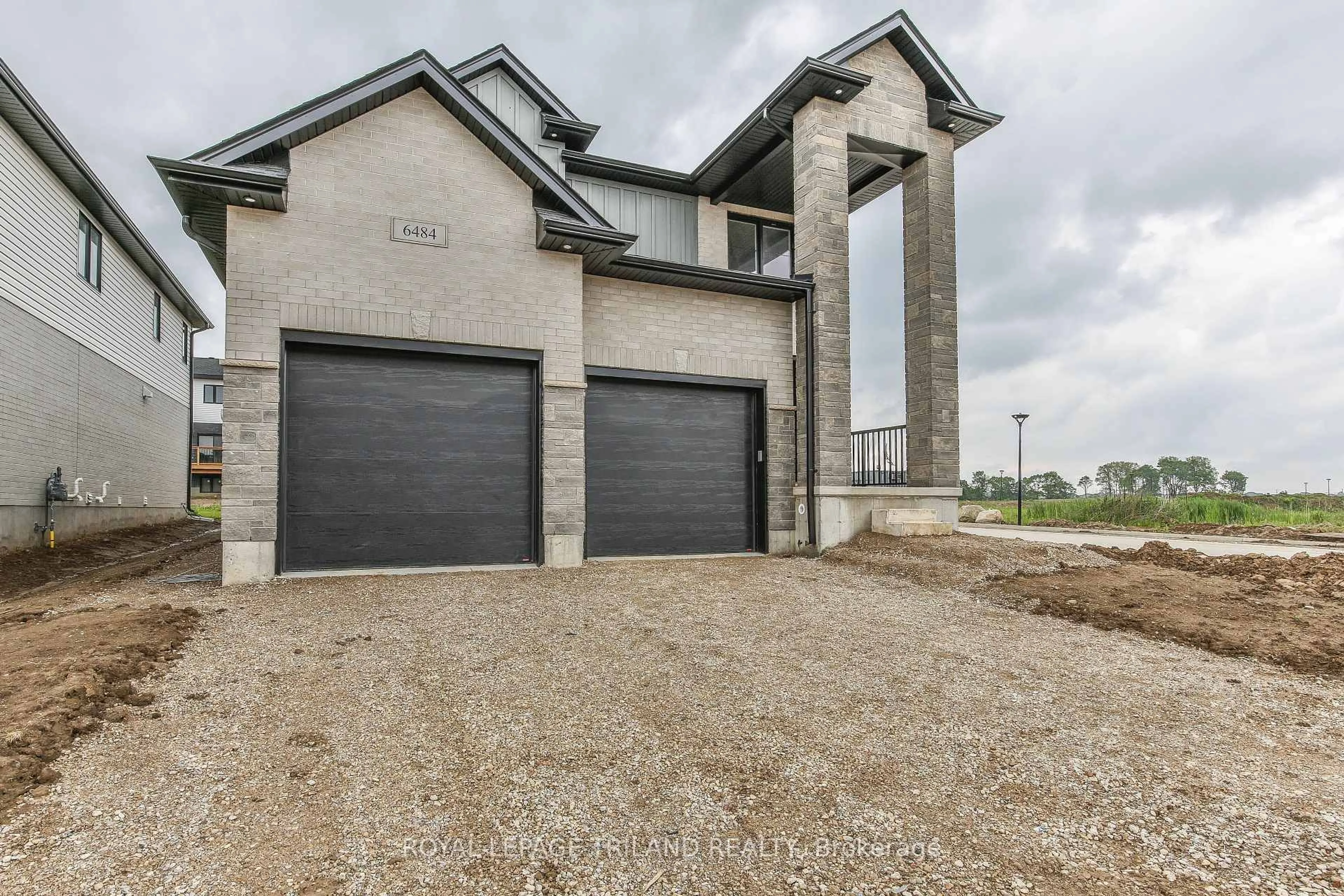 Home with brick exterior material, street for 6484 Heathwoods Ave, London South Ontario N6P 0J7