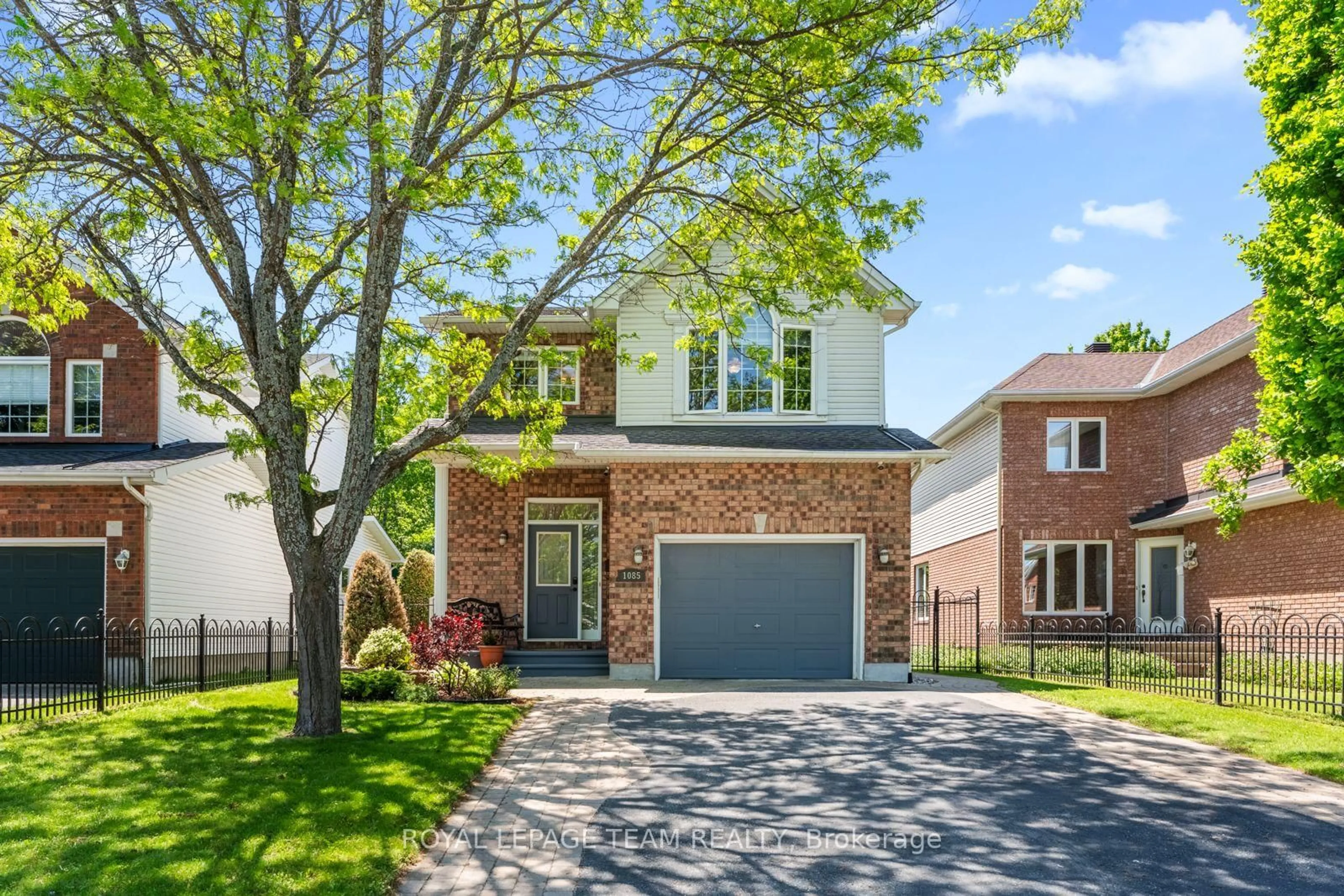 Home with brick exterior material, street for 1085 Ambercrest St, Ottawa Ontario K1J 1G3