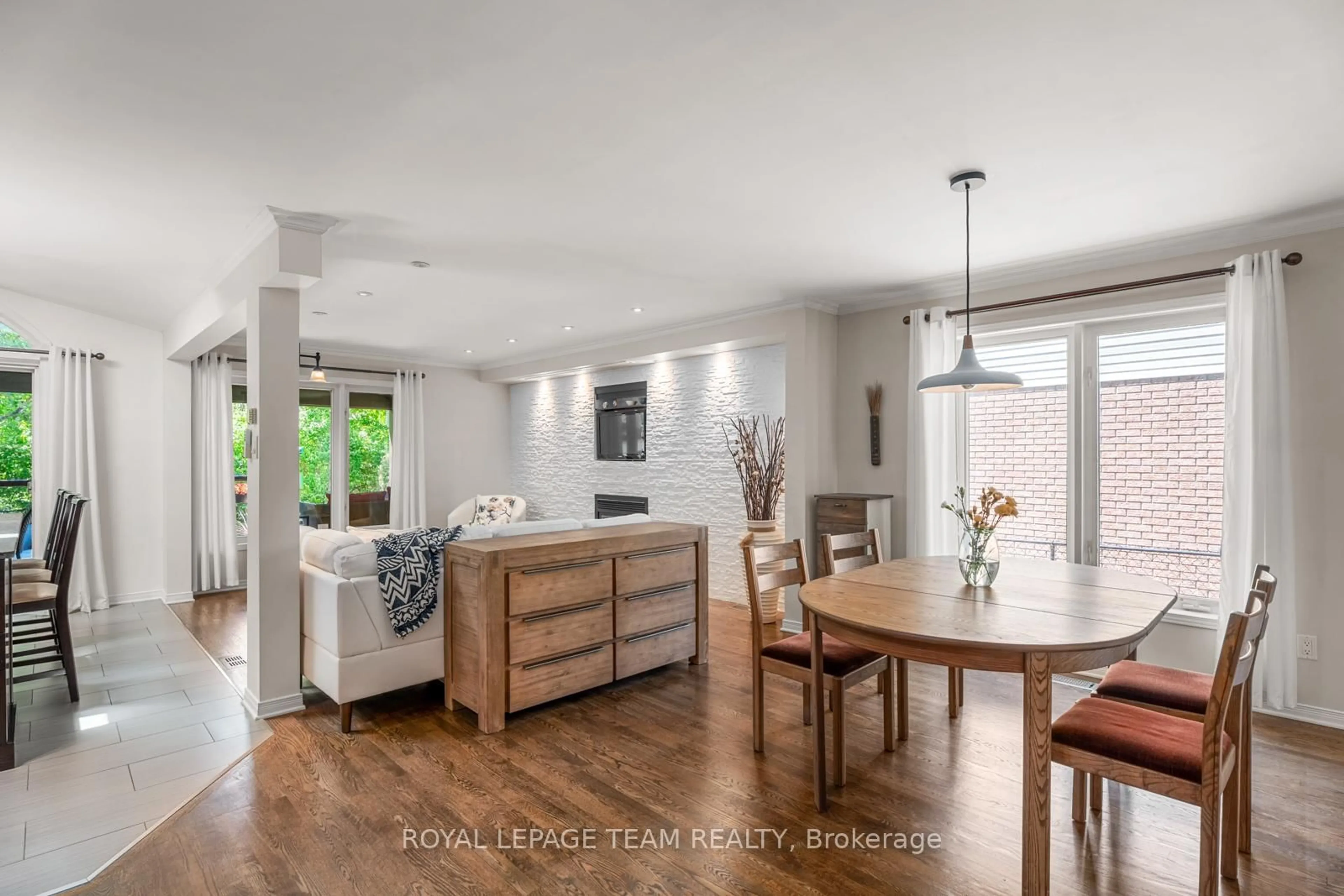 Open concept kitchen, wood/laminate floor for 1085 Ambercrest St, Ottawa Ontario K1J 1G3