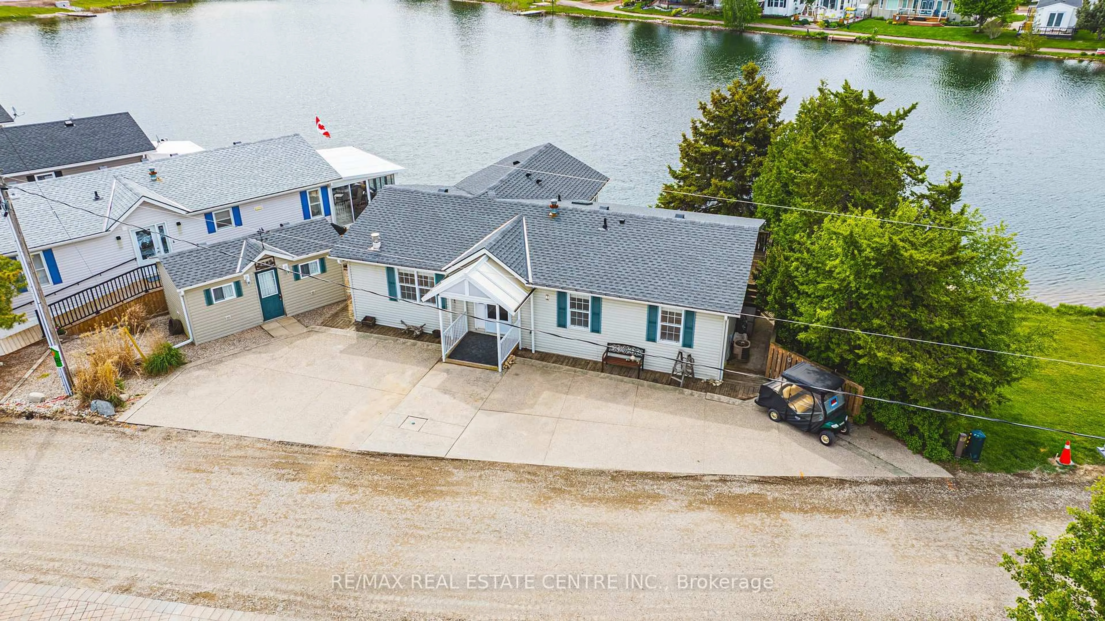 A pic from outside/outdoor area/front of a property/back of a property/a pic from drone, water/lake/river/ocean view for 2 Hemlock Crescent Pvt Cres, Puslinch Ontario N0B 2K0