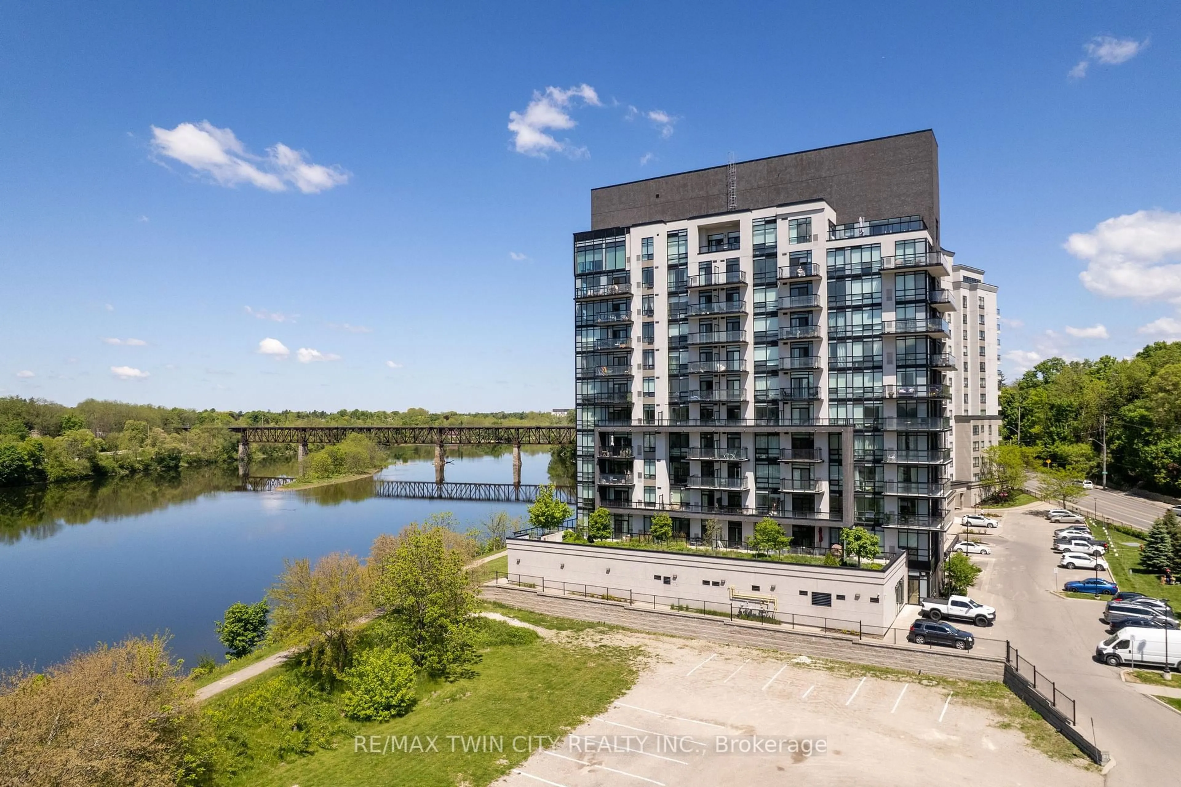 A pic from outside/outdoor area/front of a property/back of a property/a pic from drone, water/lake/river/ocean view for 150 Water St #407, Cambridge Ontario N1R 0B5