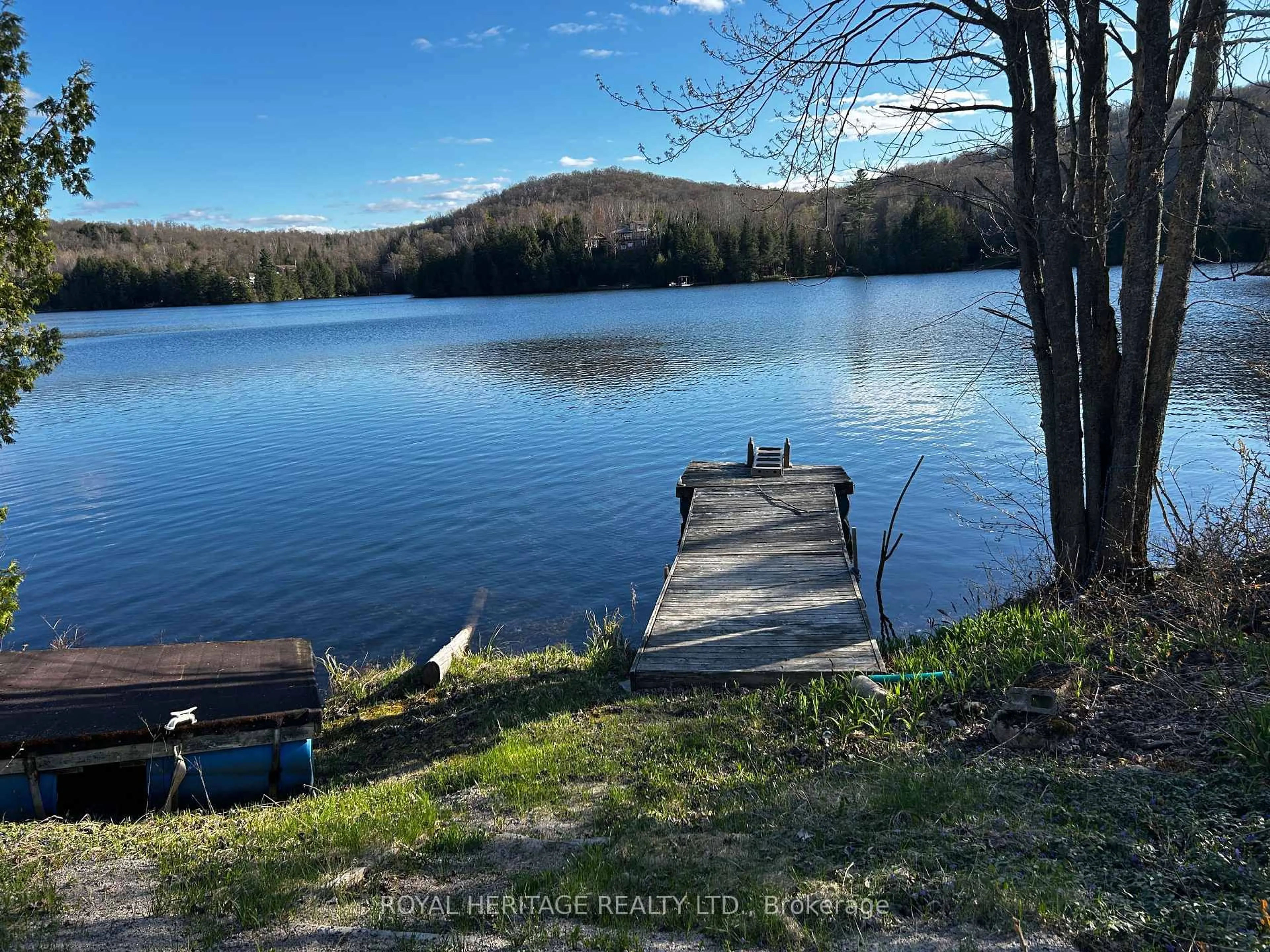A pic from outside/outdoor area/front of a property/back of a property/a pic from drone, water/lake/river/ocean view for 256 Trout Lake Rd, Bancroft Ontario K0L 1C0