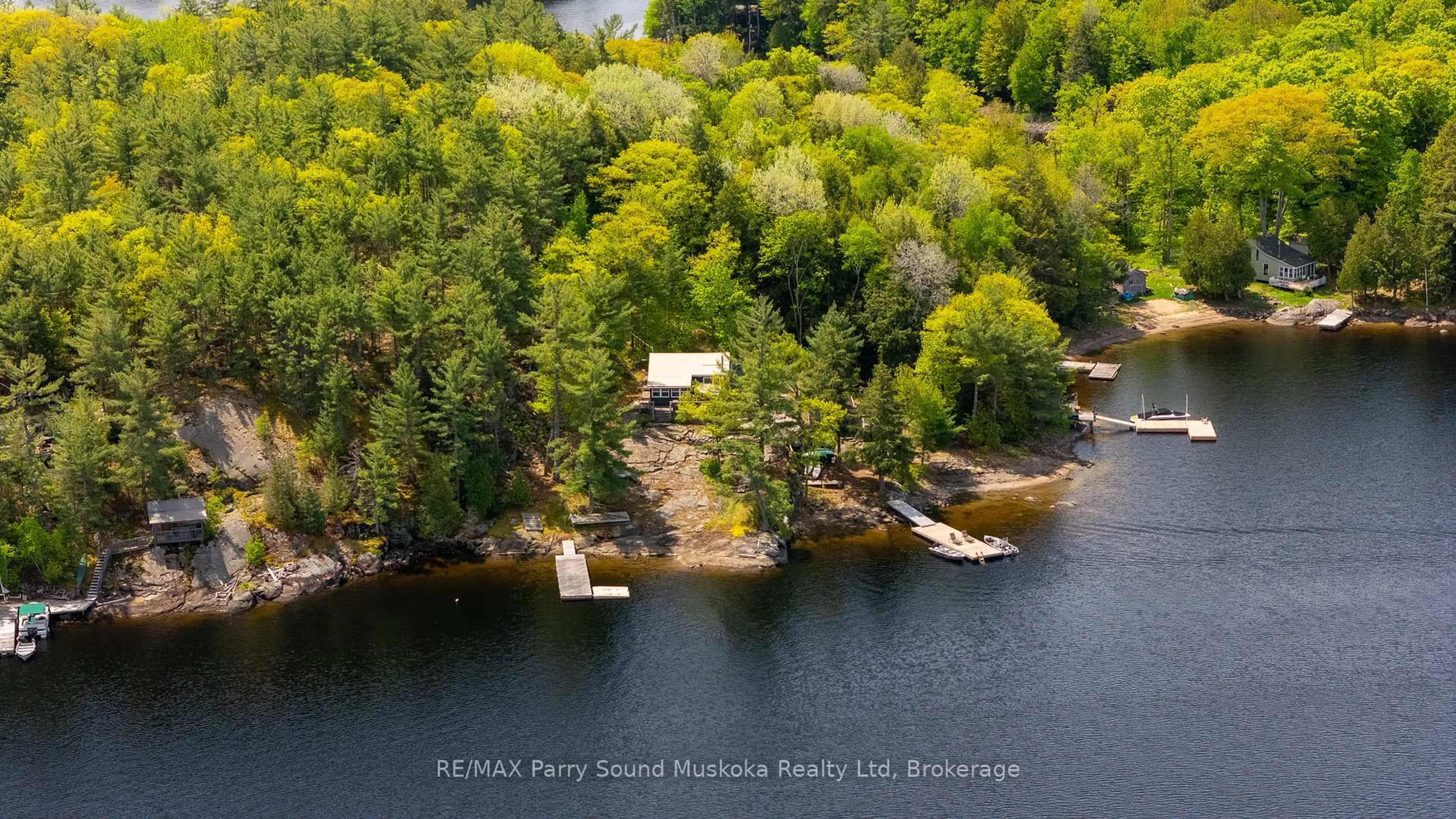 A pic from outside/outdoor area/front of a property/back of a property/a pic from drone, water/lake/river/ocean view for 7 Isabella Island, The Archipelago Ontario P2A 2W8