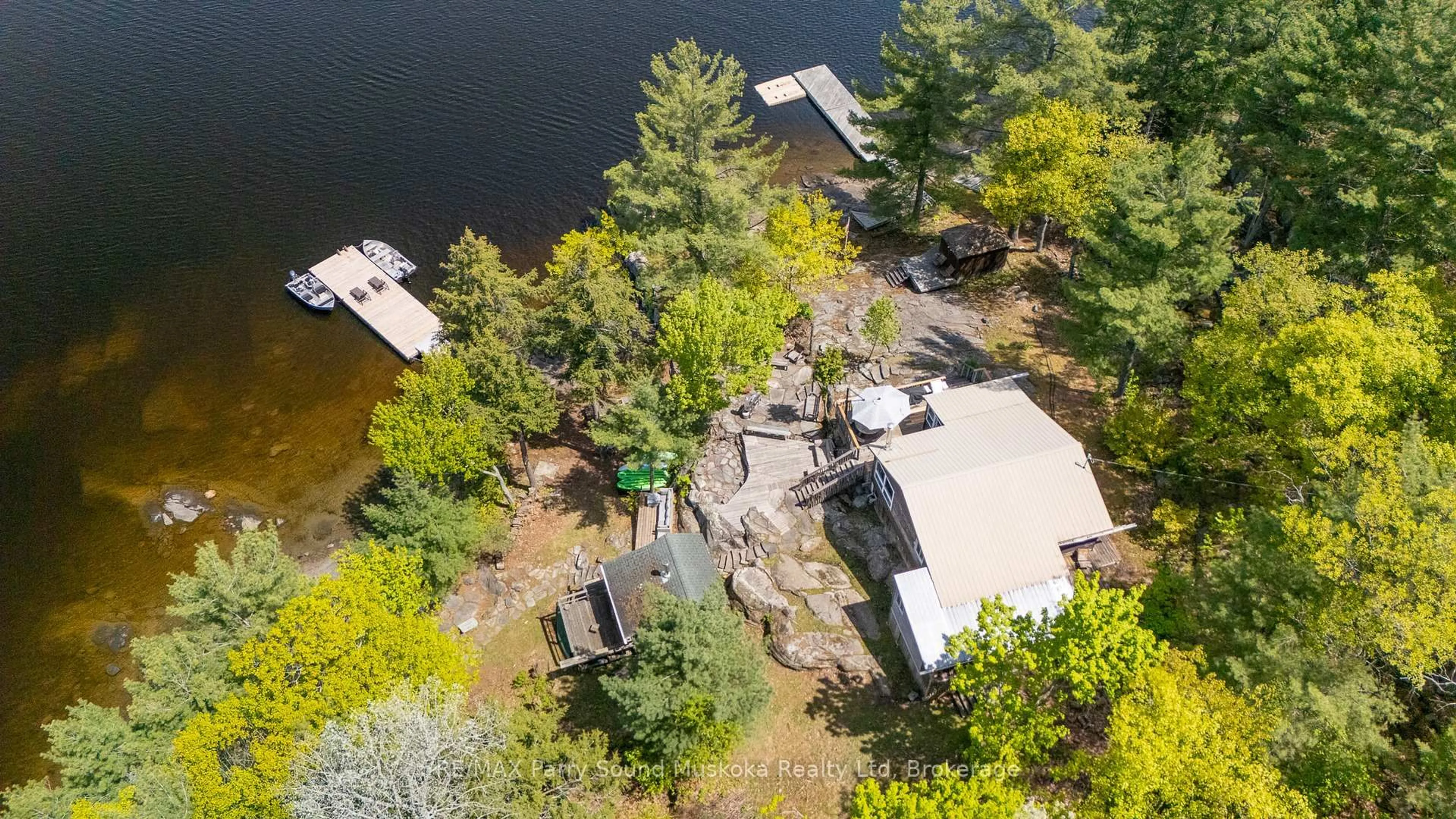 A pic from outside/outdoor area/front of a property/back of a property/a pic from drone, water/lake/river/ocean view for 7 Isabella Island, The Archipelago Ontario P2A 2W8