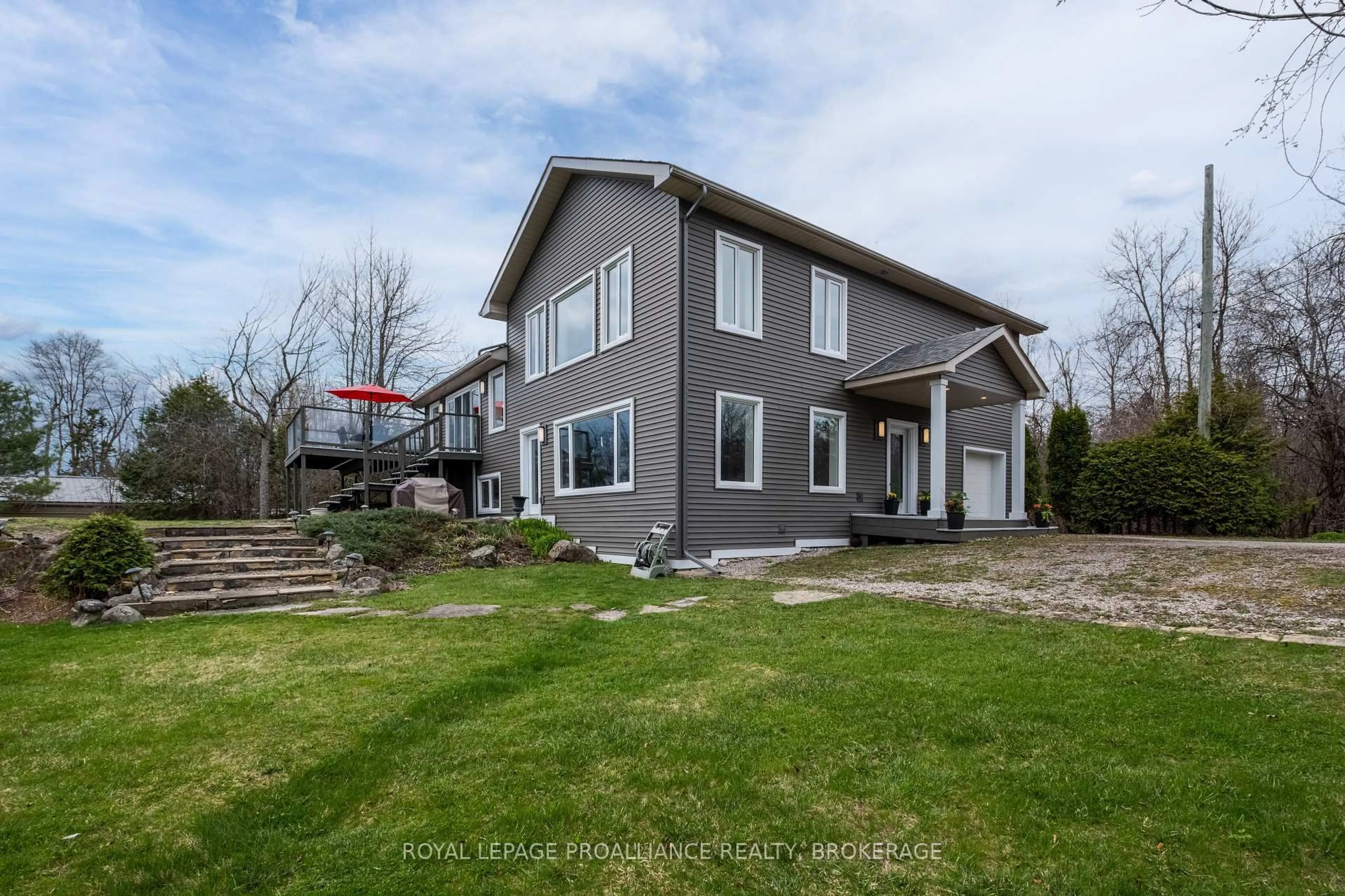 Home with vinyl exterior material, unknown for 2749 Lakefield Dr, Inverary Ontario K0H 1X0
