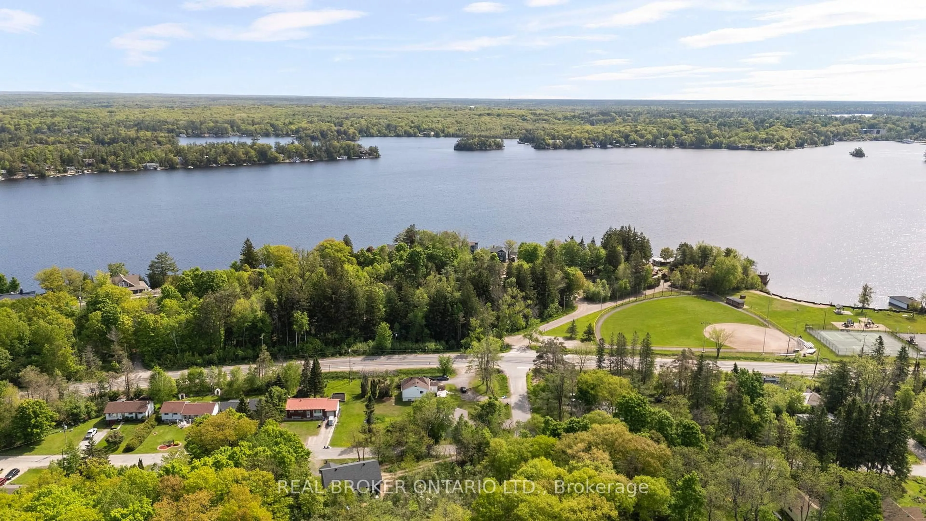 A pic from outside/outdoor area/front of a property/back of a property/a pic from drone, water/lake/river/ocean view for 180 Bakery Lane, Gravenhurst Ontario P1P 1R2