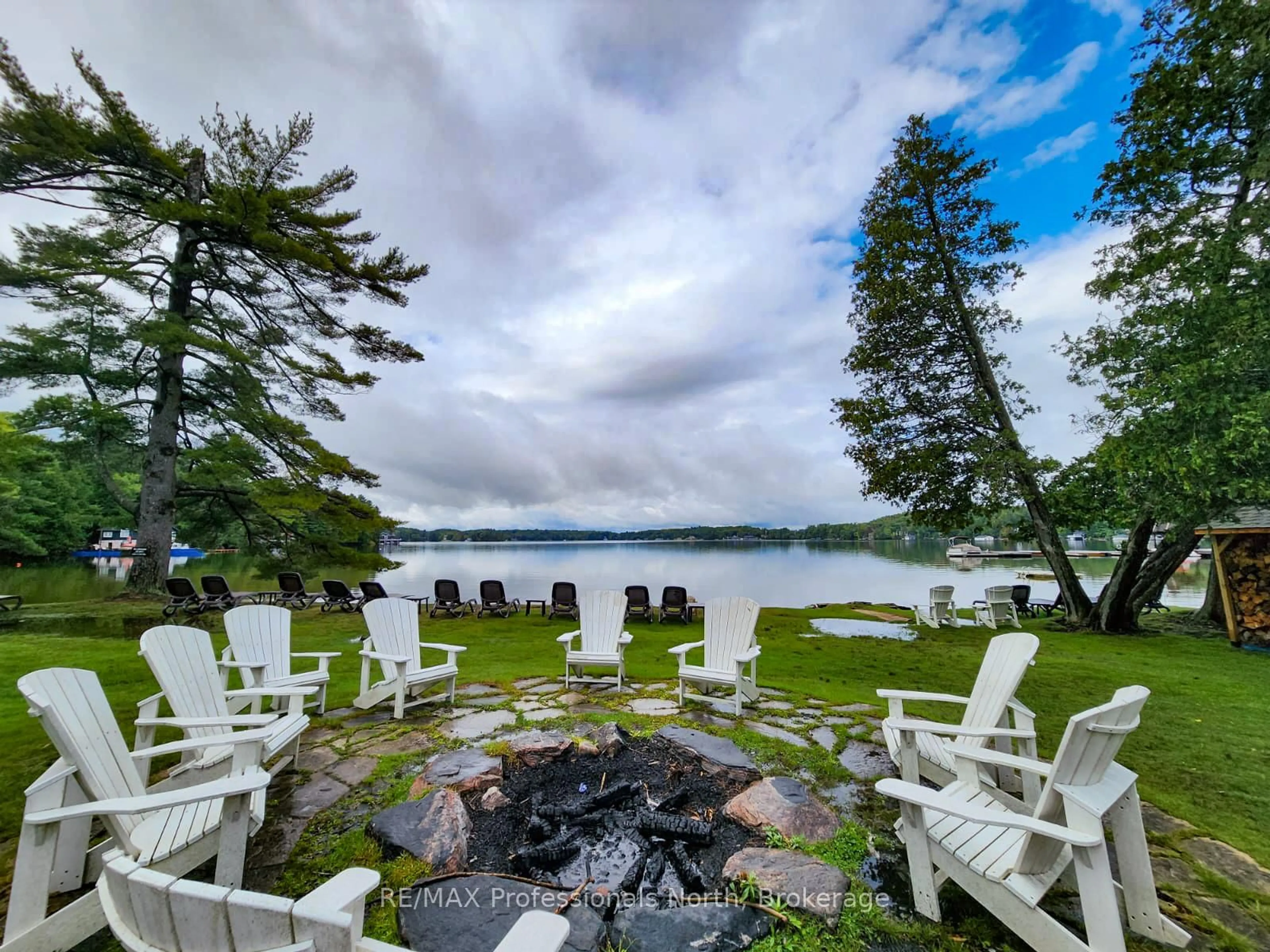 Patio, water/lake/river/ocean view for 3876 MUSKOKA ROAD 118 N/A #Sandfield 2, Week 10, Muskoka Lakes Ontario P0B 1J0