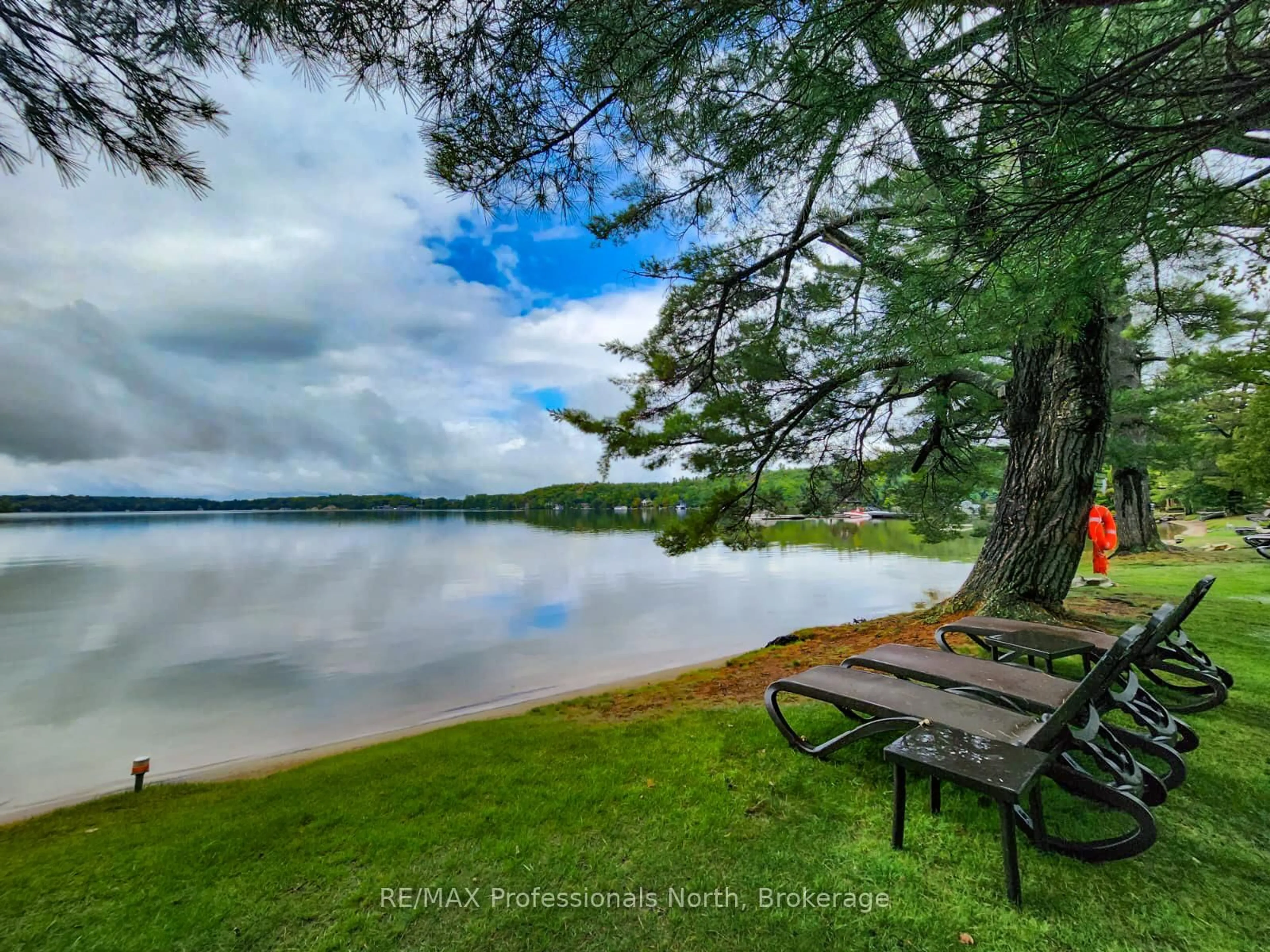 Patio, water/lake/river/ocean view for 3876 MUSKOKA ROAD 118 N/A #Sandfield 2, Week 10, Muskoka Lakes Ontario P0B 1J0